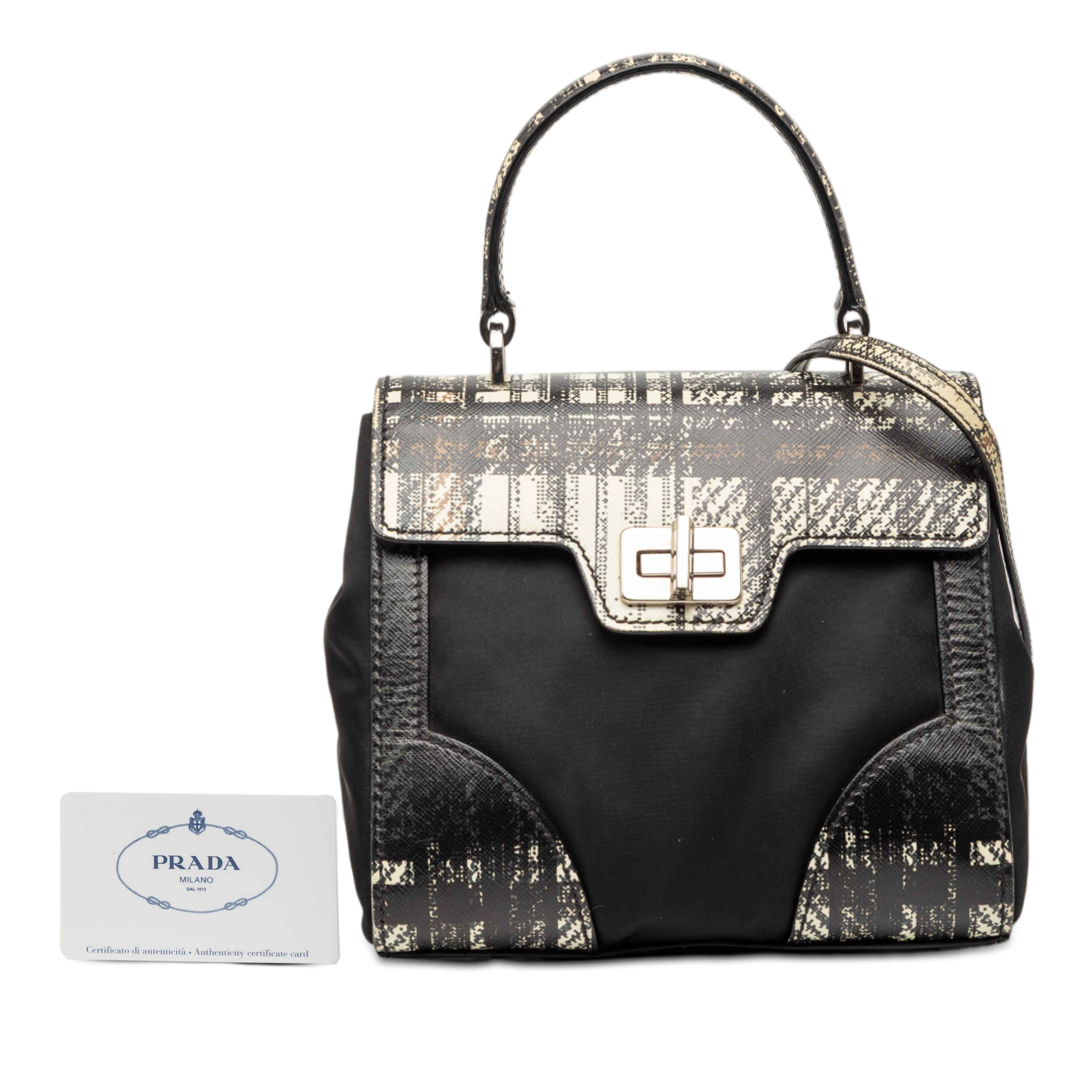 Prada Tartan Saffiano Trimmed Tessuto Satchel, från Luxclusif, i färgen svart. Klicka för att öppna bilden i stort format