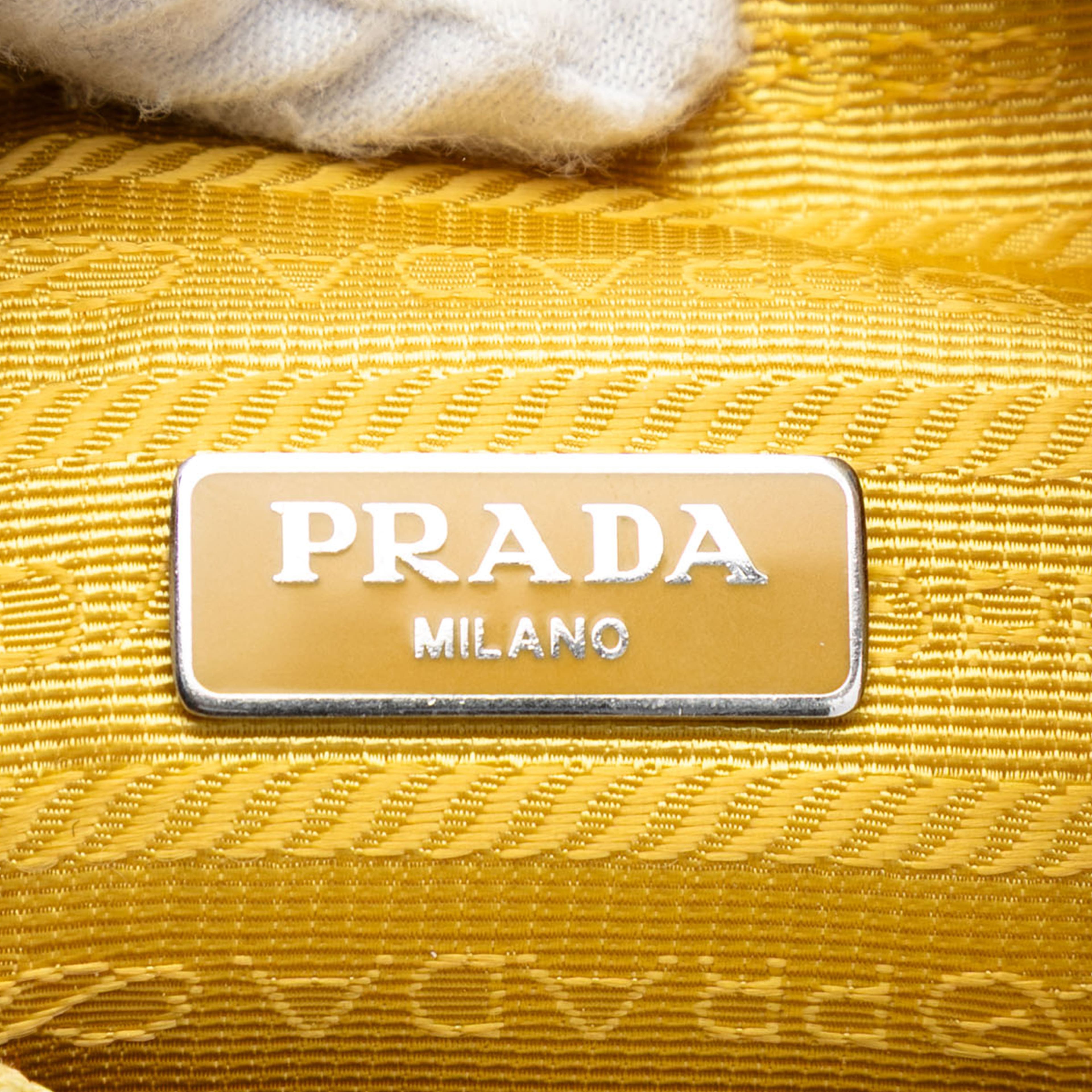 Prada Mini Tessuto Re Edition 2000 Shoulder Bag, från Luxclusif, i färgen light yellow. Klicka för att öppna bilden i stort format