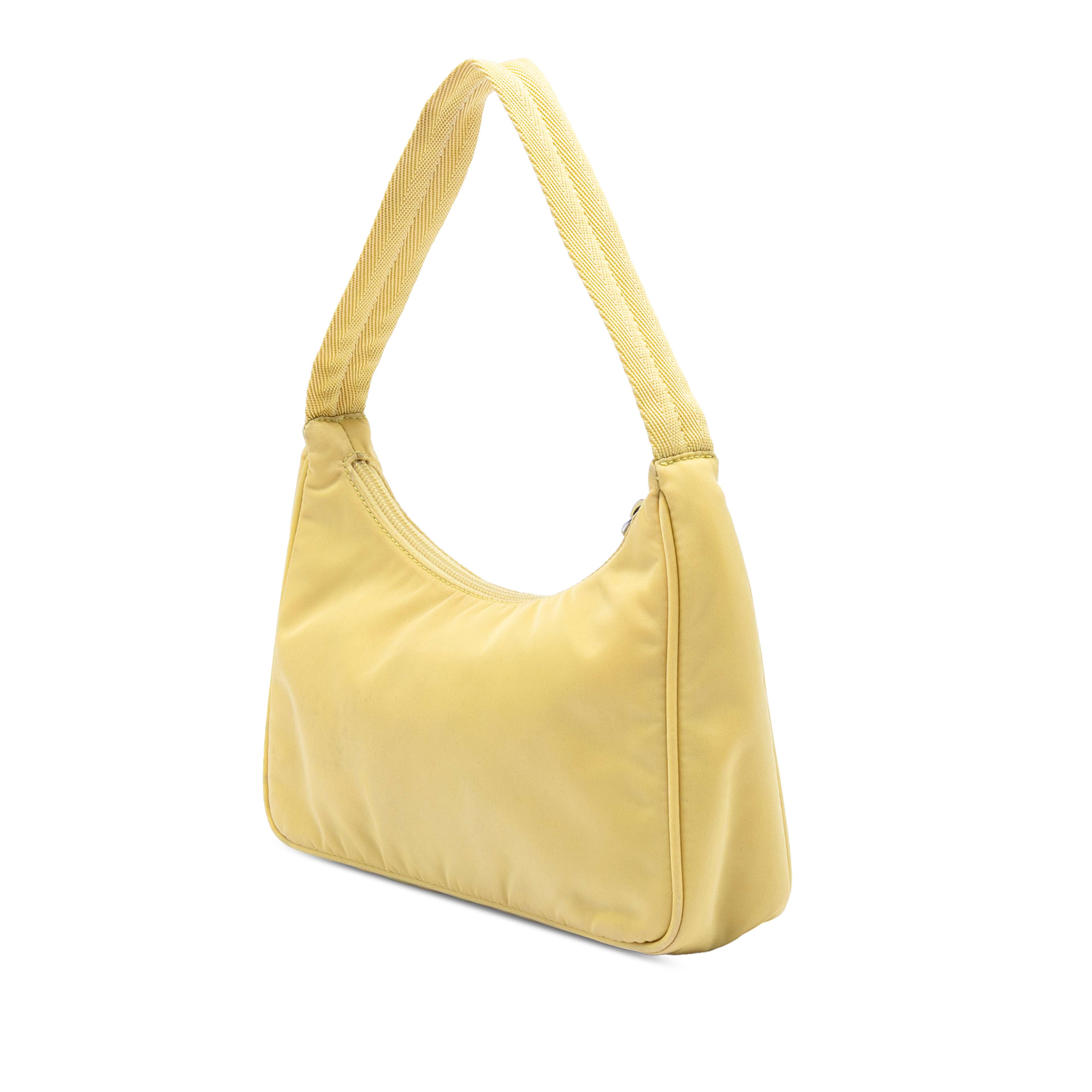 Prada Mini Tessuto Re Edition 2000 Shoulder Bag, från Luxclusif, i färgen light yellow. Klicka för att öppna bilden i stort format