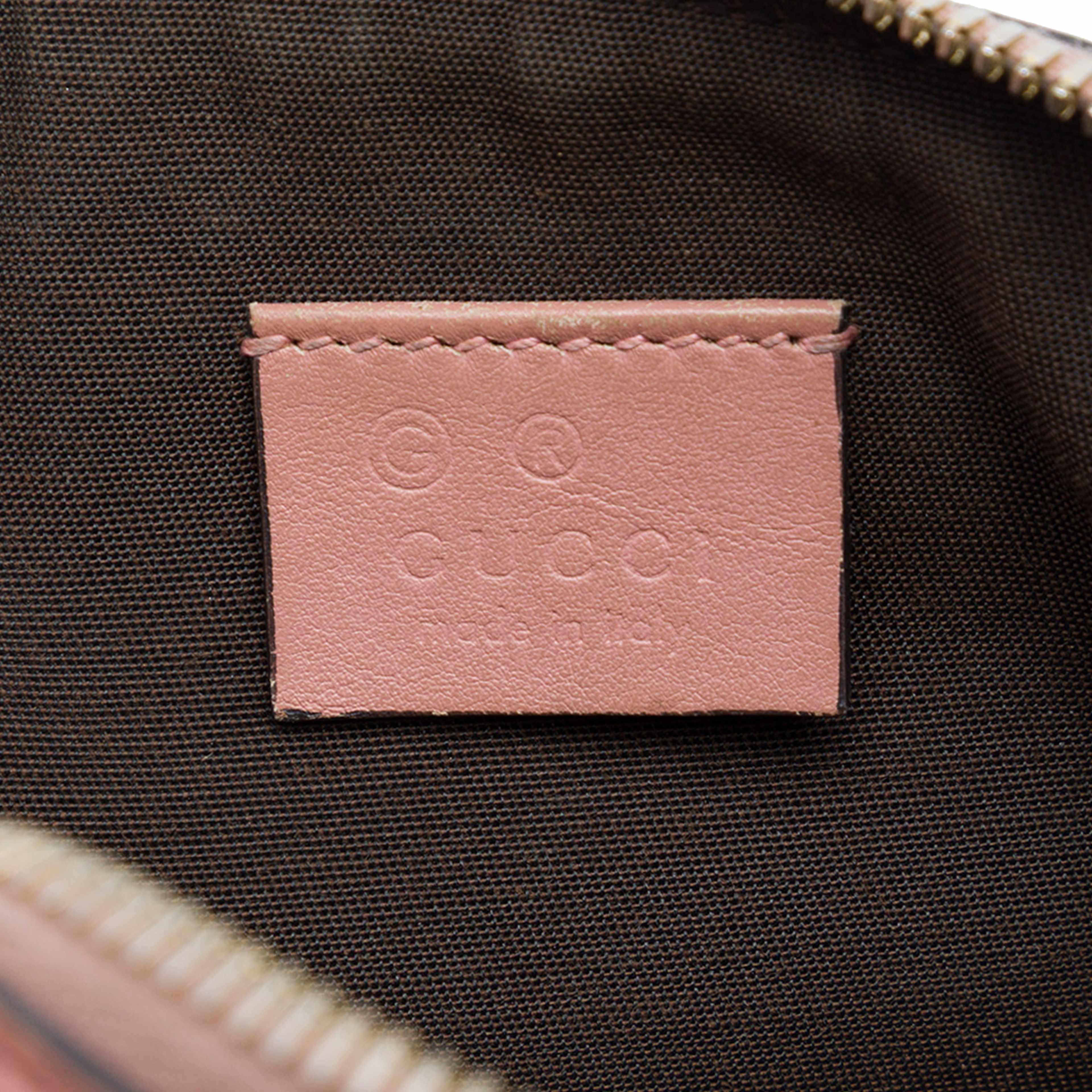 Gucci Microguccissima Cosmetic Pouch, från Luxclusif, i färgen rosa. Klicka för att öppna bilden i stort format