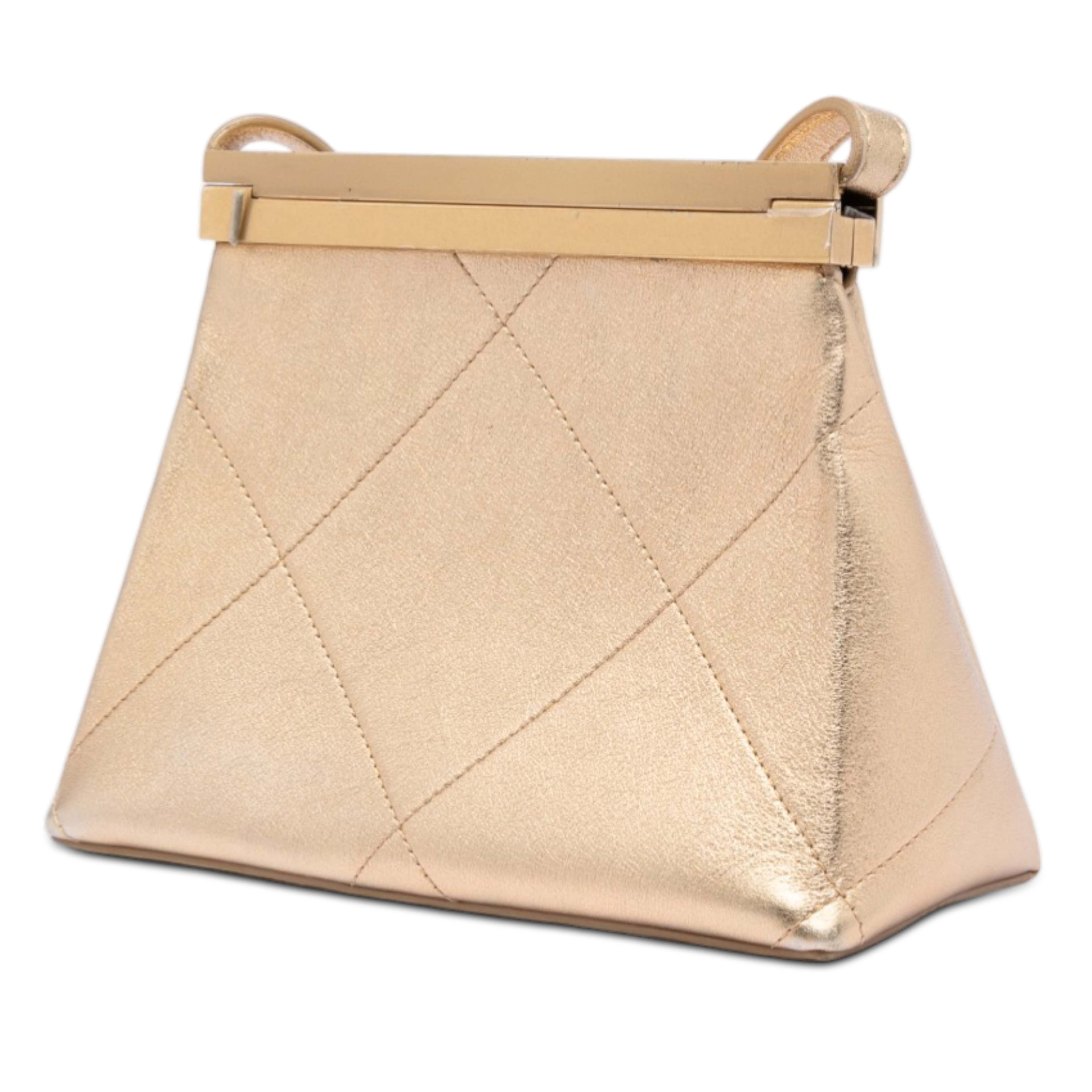 Chanel Small Calfskin Kiss Lock Frame Bag, från Luxclusif, i färgen gold. Klicka för att öppna bilden i stort format
