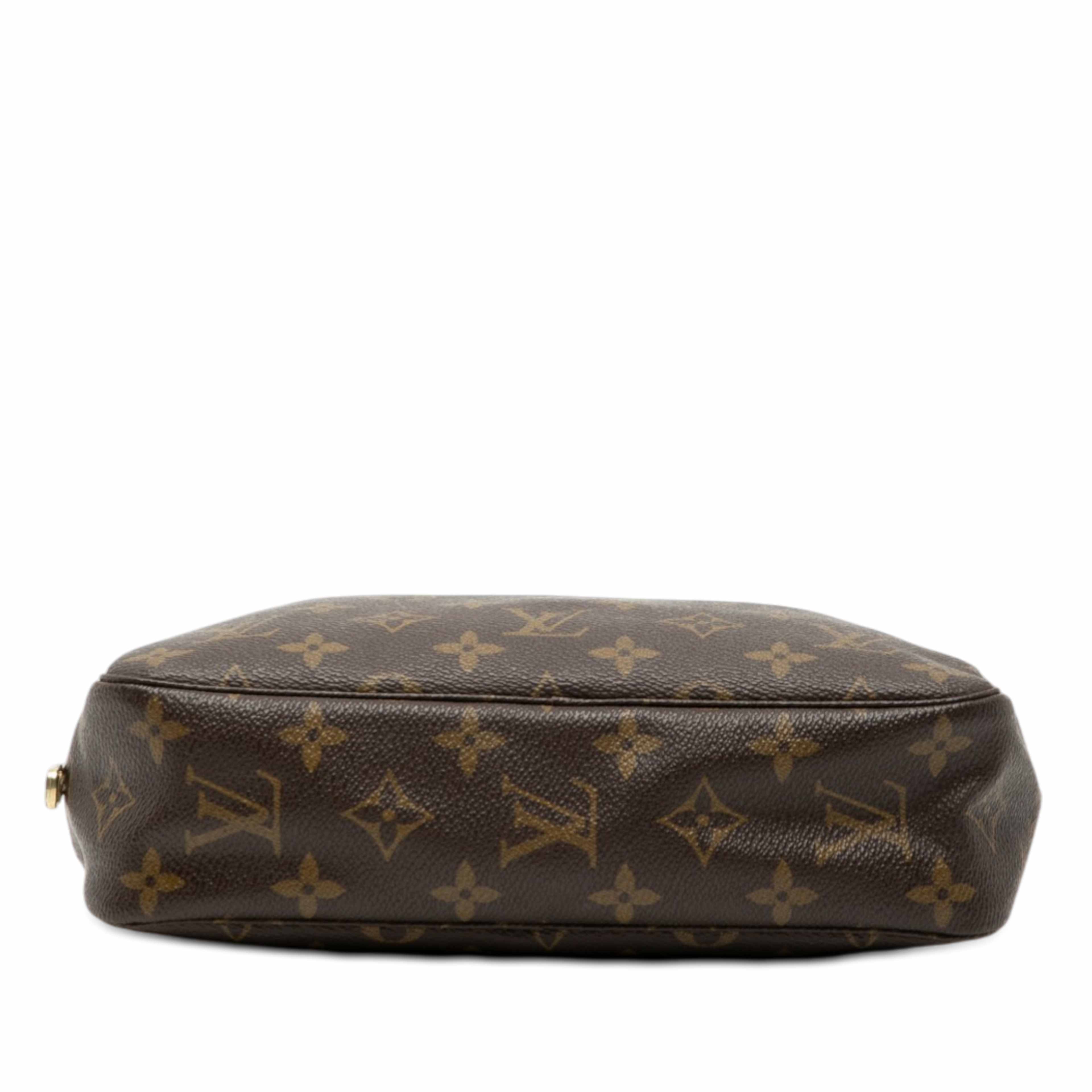 Louis Vuitton Monogram Trousse Toilette 23, från Luxclusif, i färgen brown. Klicka för att öppna bilden i stort format