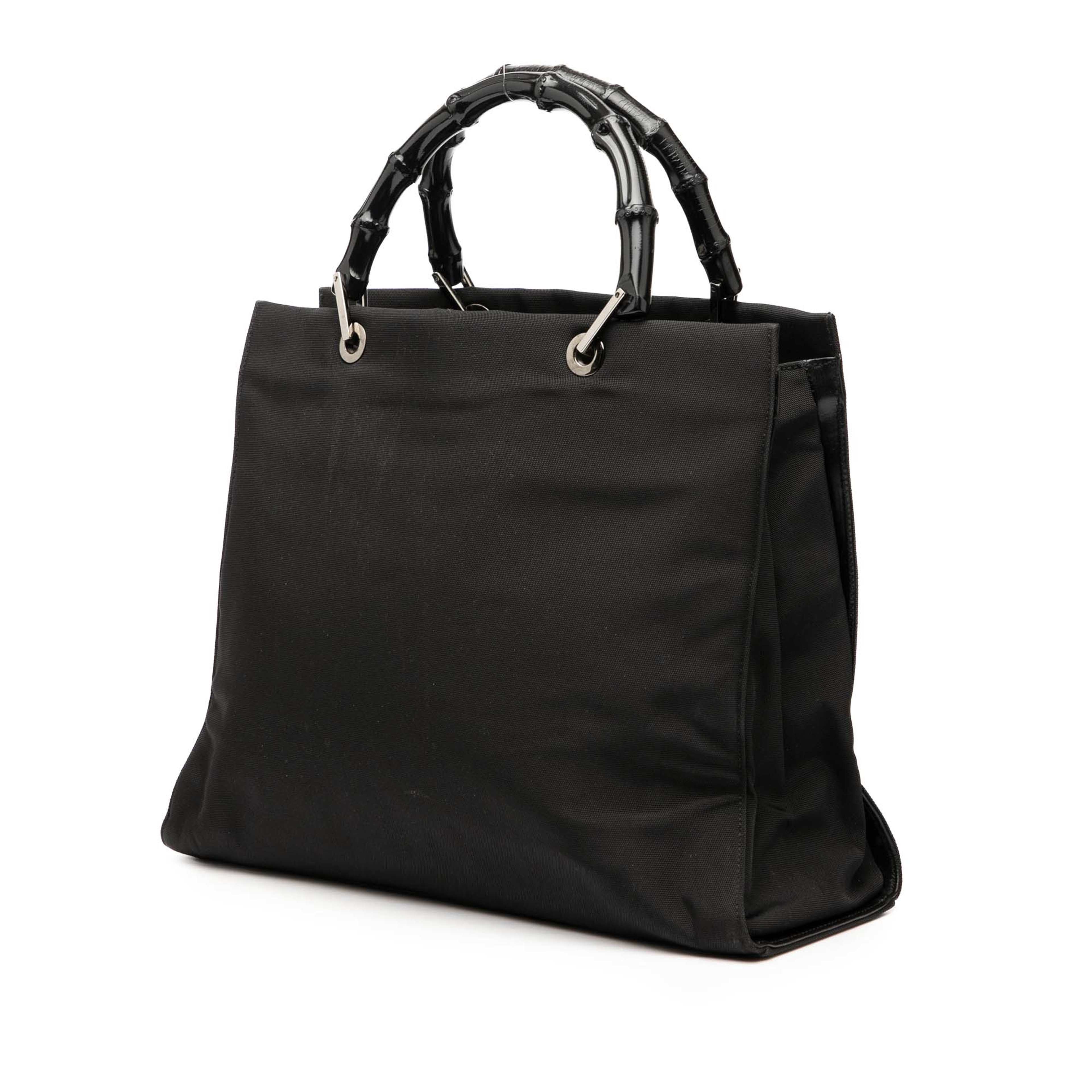 Gucci Gg Canvas Bamboo Handbag, från Luxclusif, i färgen black. Klicka för att öppna bilden i stort format