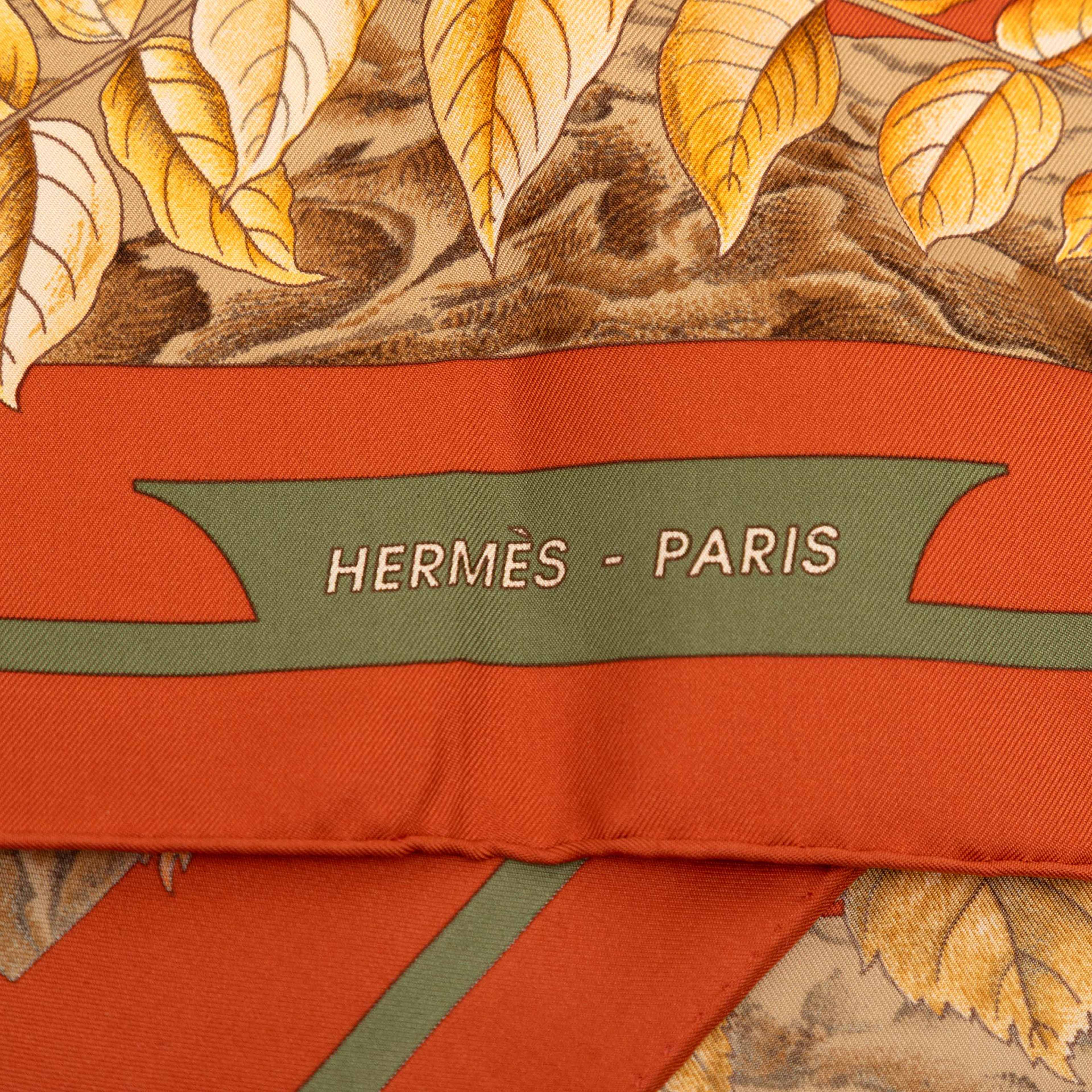 Hermès Casse Noisette Silk Scarf 90, från Luxclusif, i färgen dark orange. Klicka för att öppna bilden i stort format