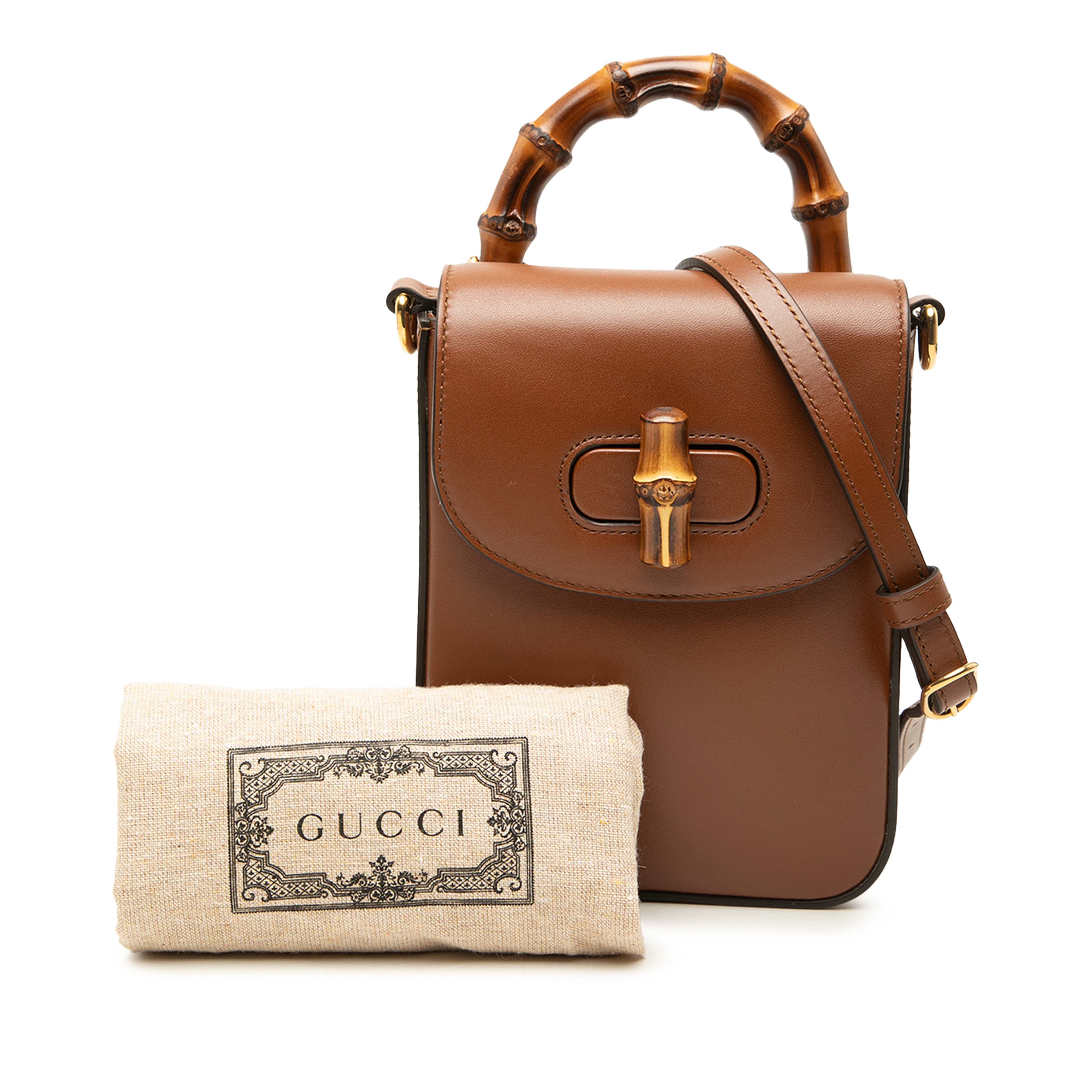 Gucci Mini Calfskin Bamboo Top Handle Bag, från Luxclusif, i färgen brun. Klicka för att öppna bilden i stort format