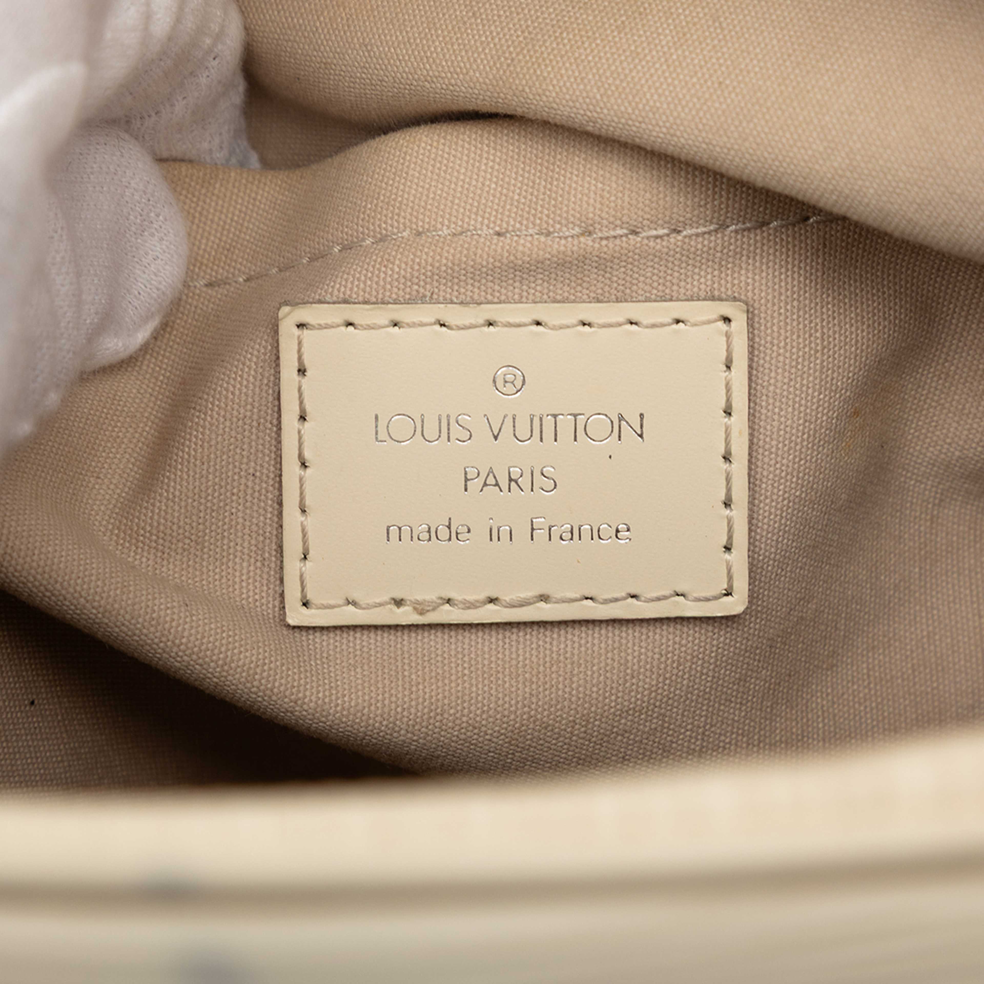 Louis Vuitton Epi Bowling Montaigne Pm, från Luxclusif, i färgen ivory. Klicka för att öppna bilden i stort format