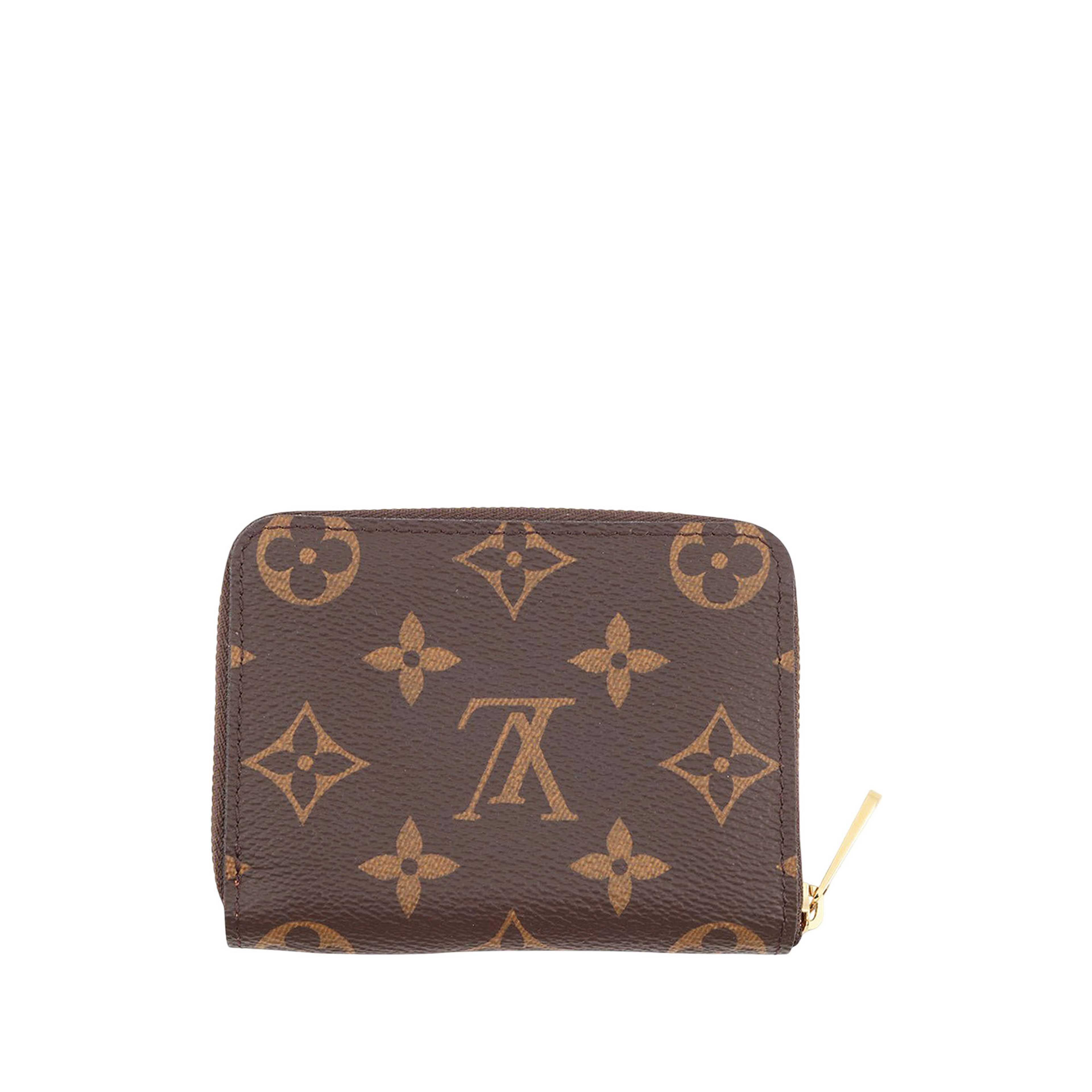 Louis Vuitton Monogram Zippy Coin Pouch, från Luxclusif, i färgen brun. Klicka för att öppna bilden i stort format