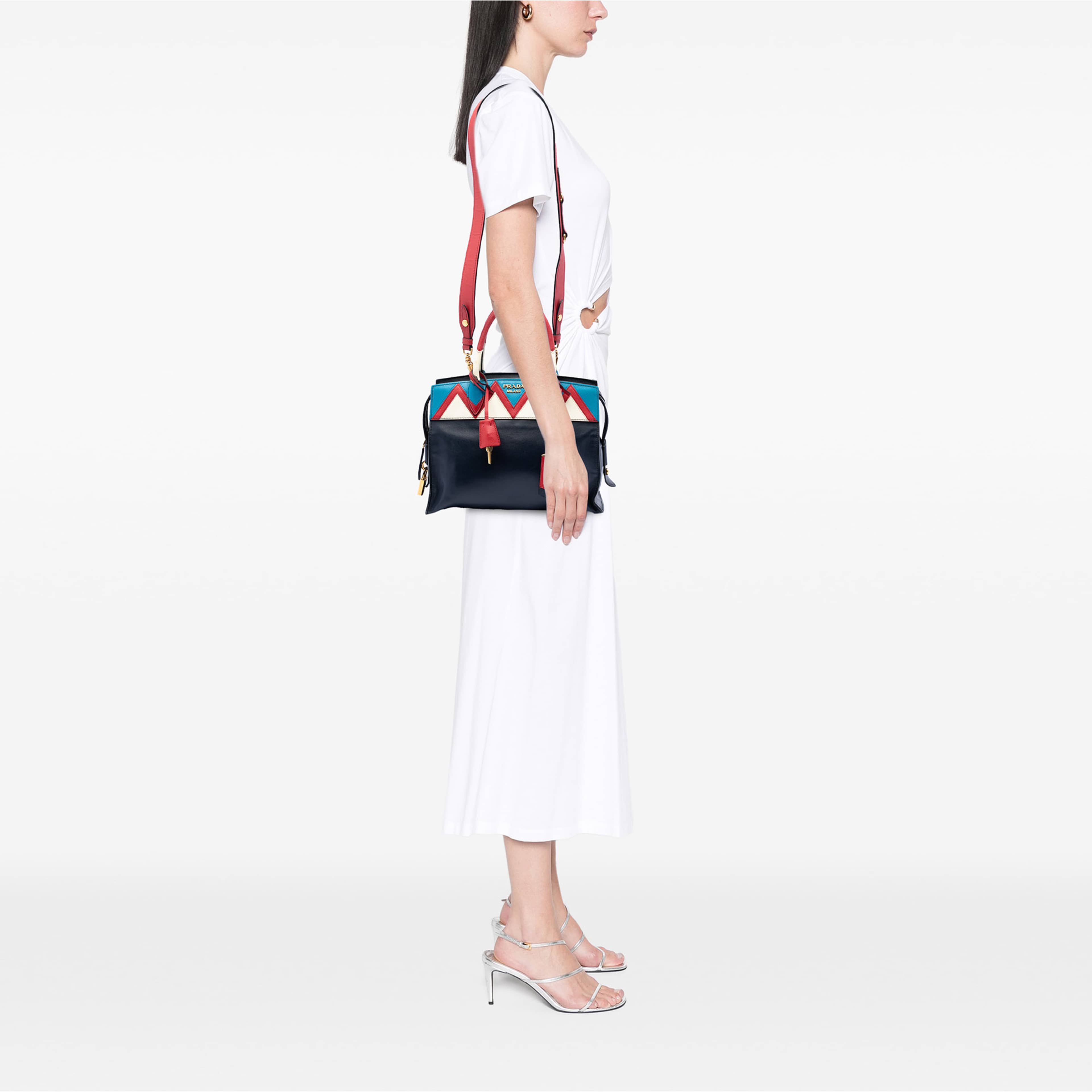 Prada Medium Saffiano Trimmed City Calf Greca Esplanade Satchel, från Luxclusif, i färgen blå. Klicka för att öppna bilden i stort format