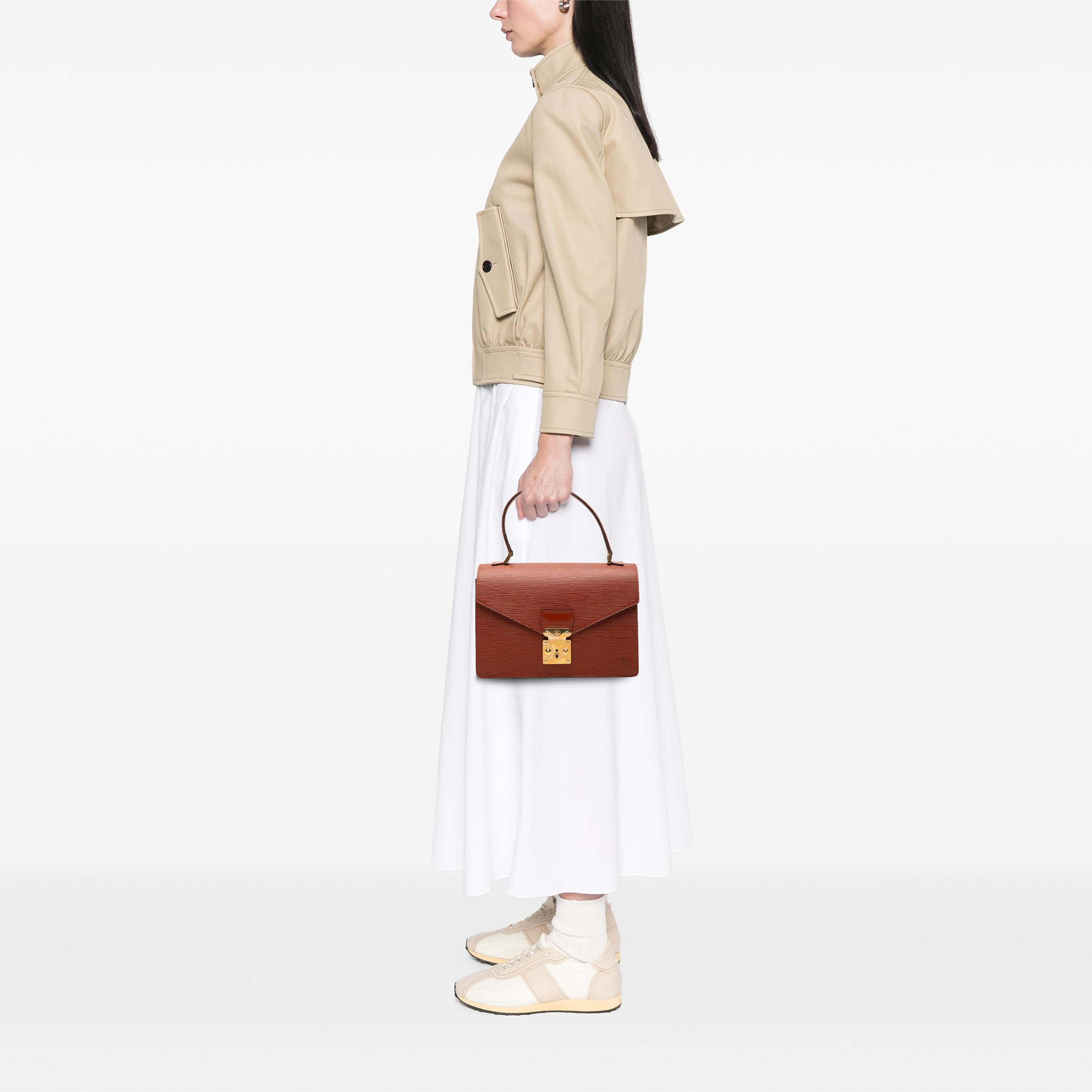 Louis Vuitton Epi Concorde Handbag, från Luxclusif, i färgen brun. Klicka för att öppna bilden i stort format