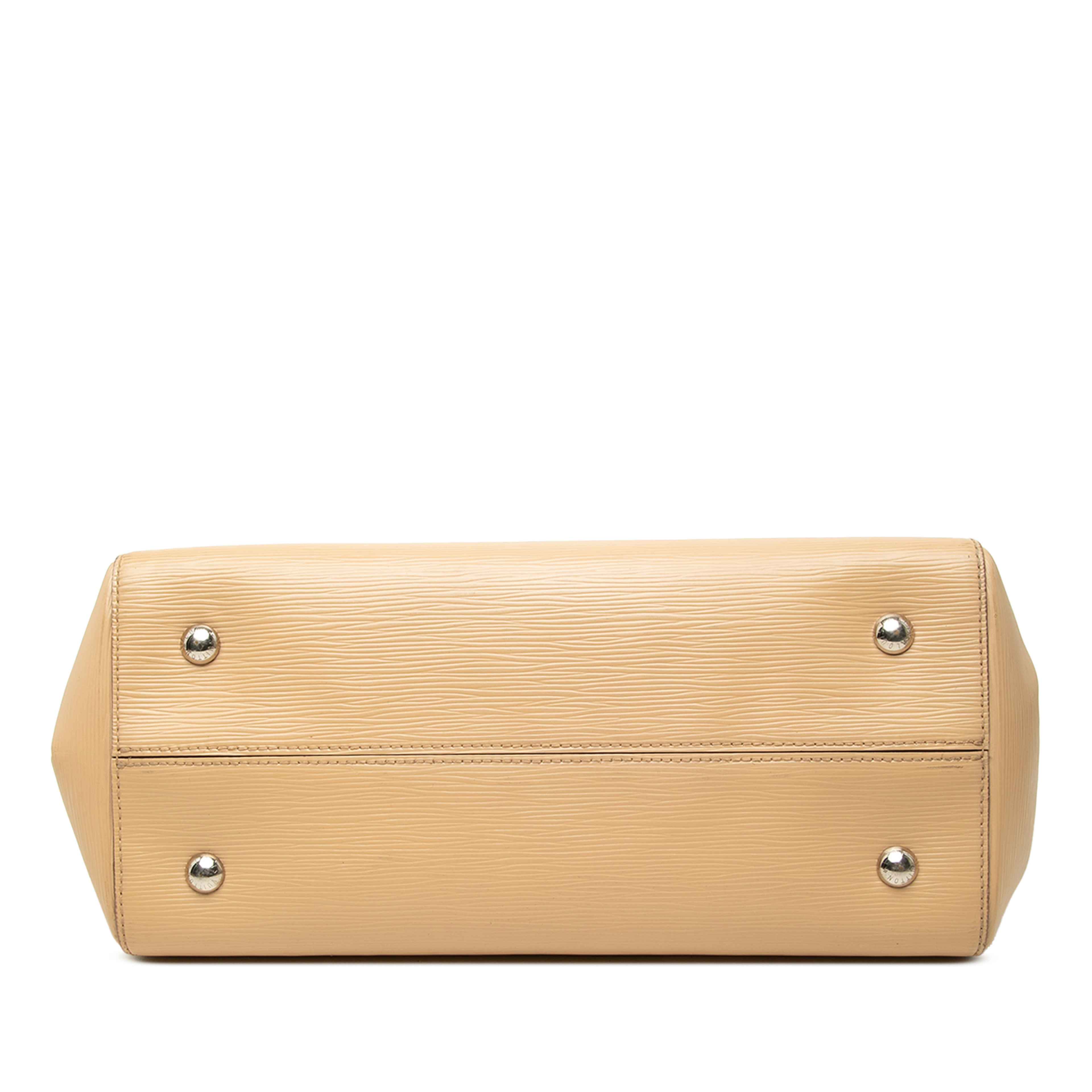 Louis Vuitton Epi Marly Mm, från Luxclusif, i färgen beige. Klicka för att öppna bilden i stort format