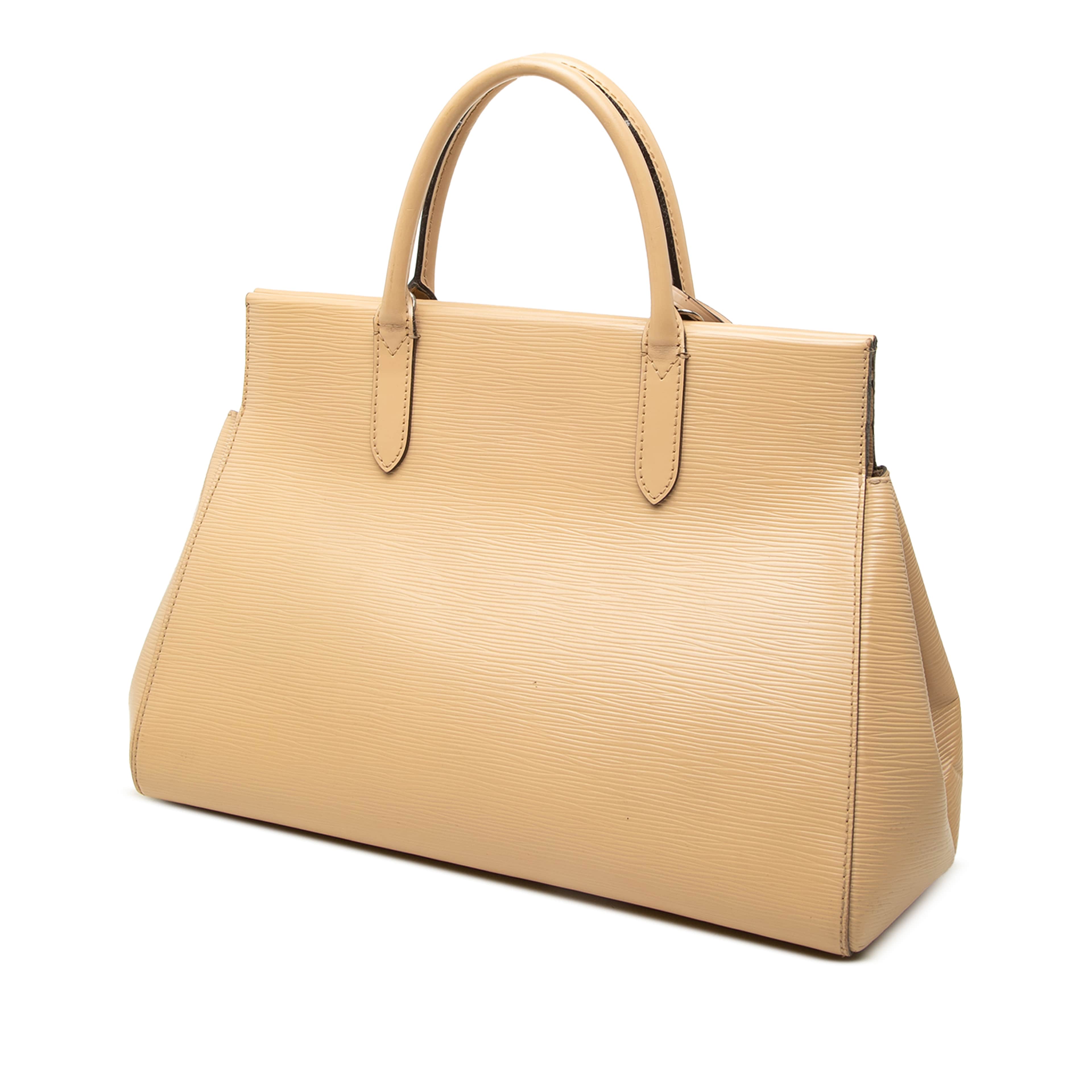 Louis Vuitton Epi Marly Mm, från Luxclusif, i färgen beige. Klicka för att öppna bilden i stort format