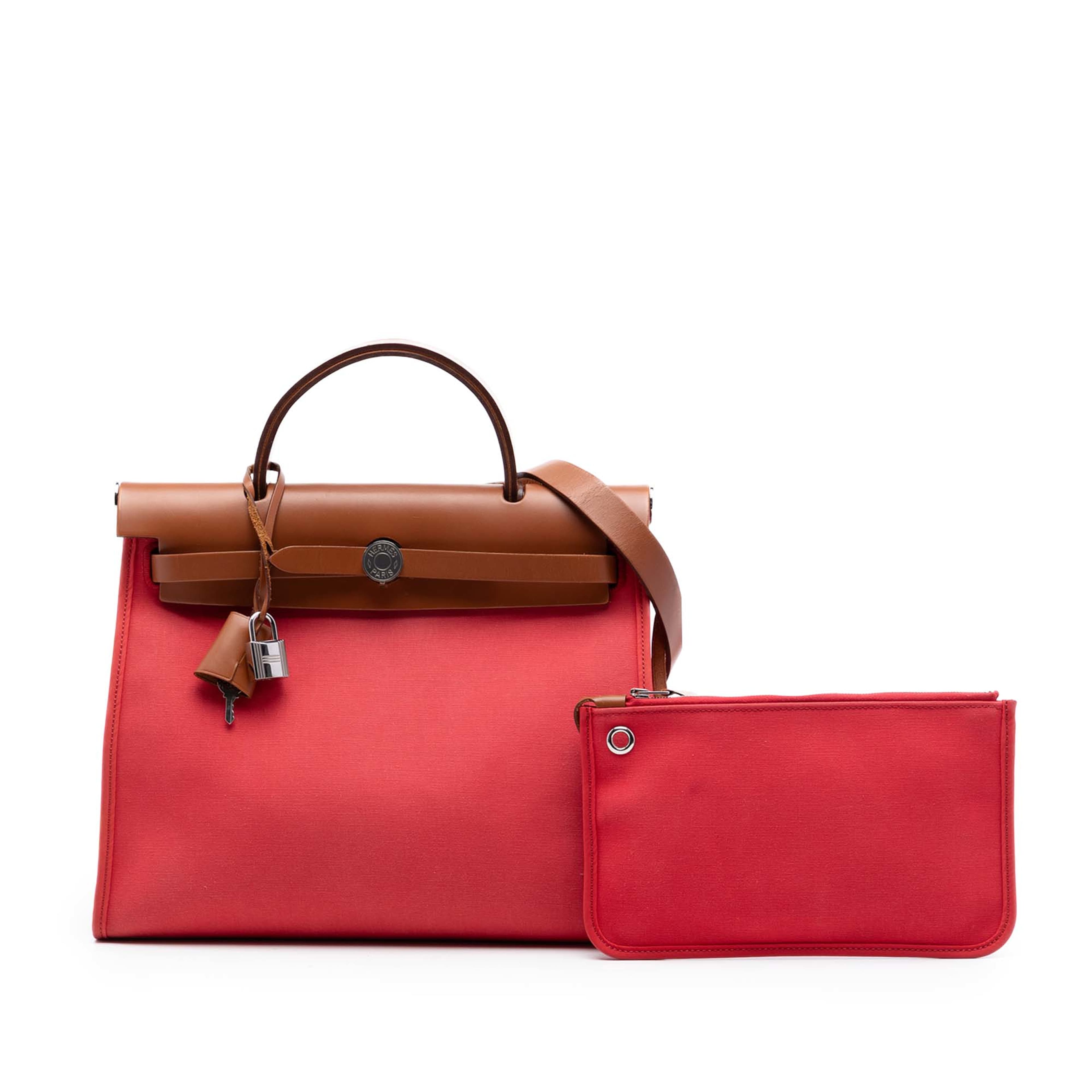 Hermès Toile Herbag Zip 31, från Luxclusif, i färgen röd. Klicka för att öppna bilden i stort format