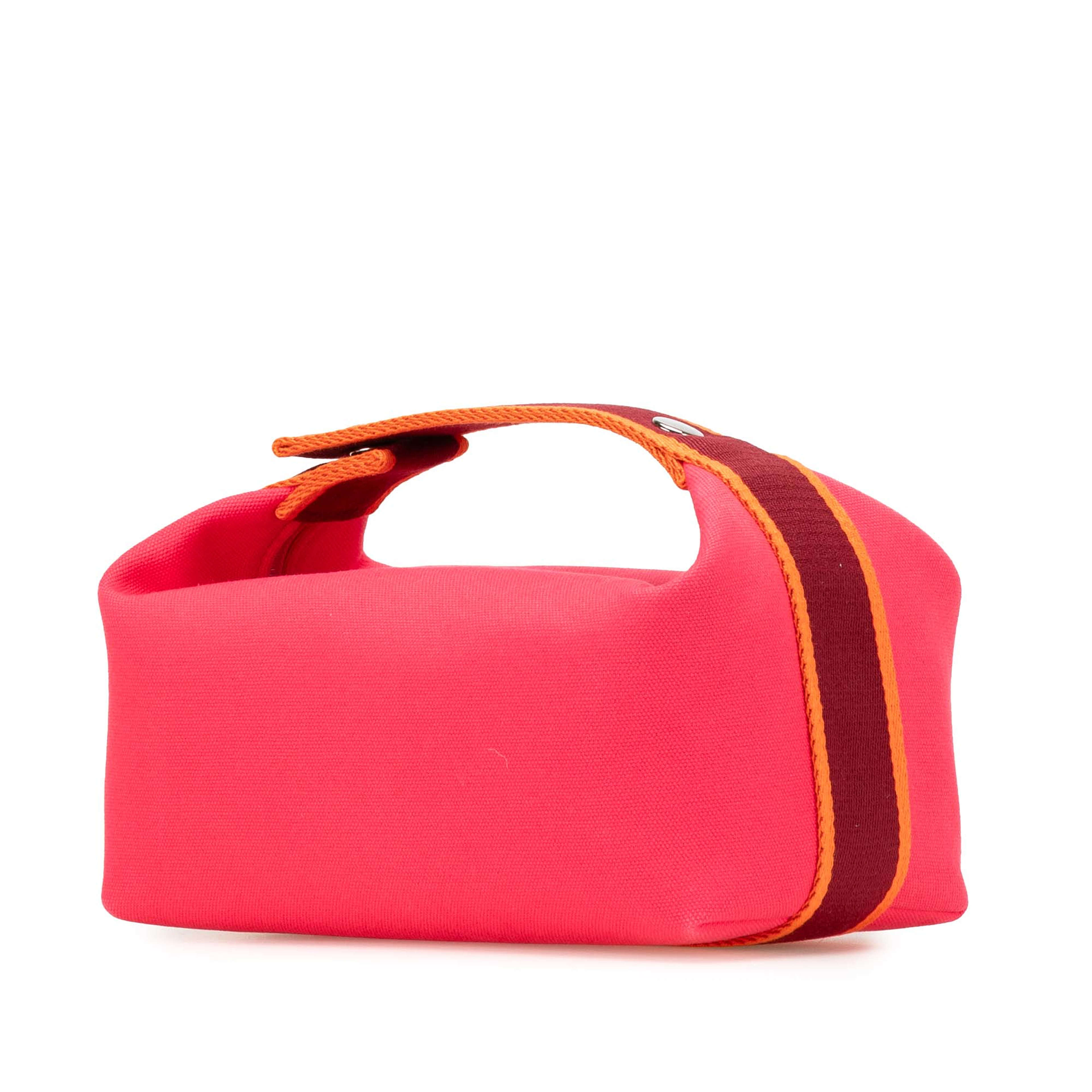 Hermès Small Canvas Bride A Brac, från Luxclusif, i färgen hot pink. Klicka för att öppna bilden i stort format
