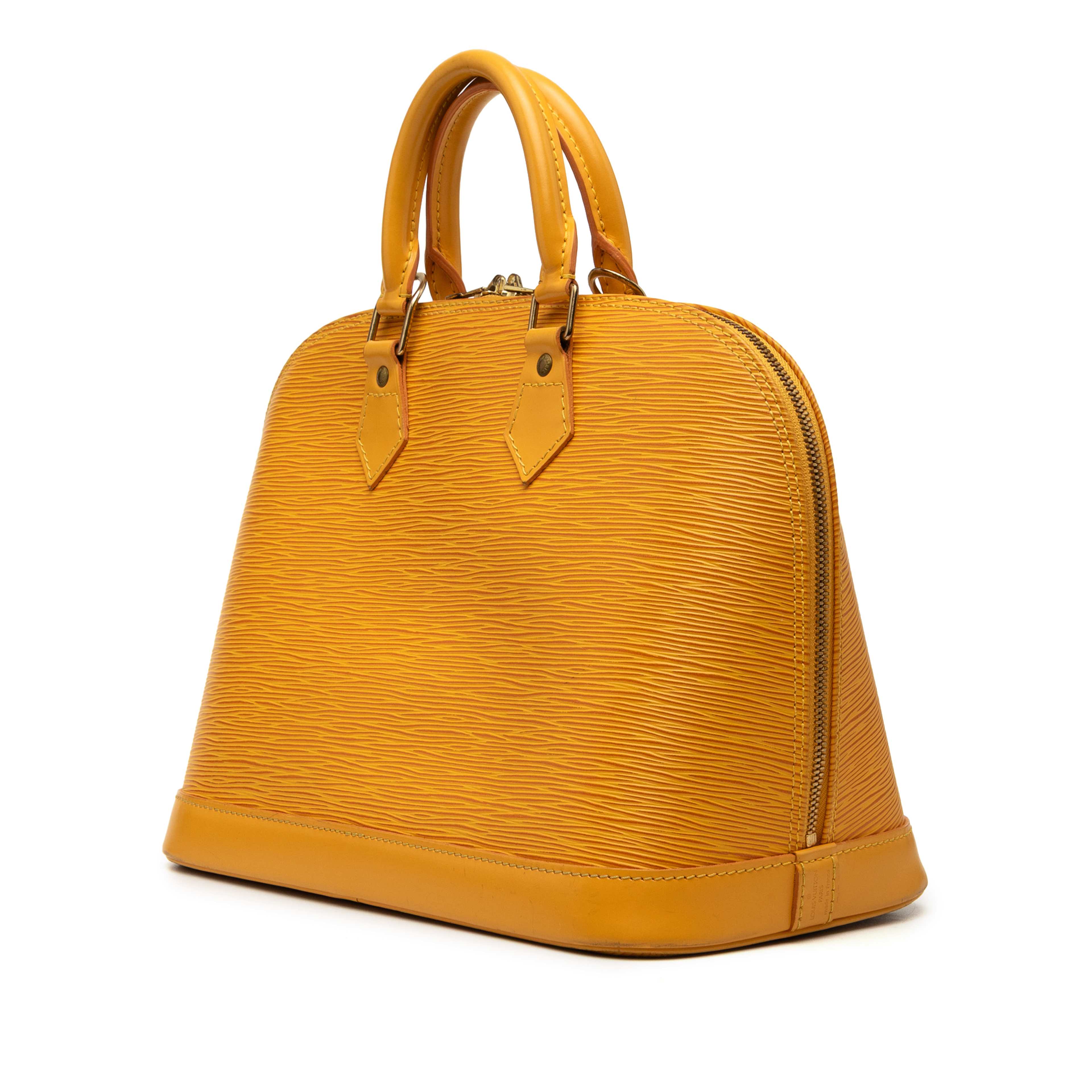 Louis Vuitton Epi Alma Pm, från Luxclusif, i färgen gul. Klicka för att öppna bilden i stort format