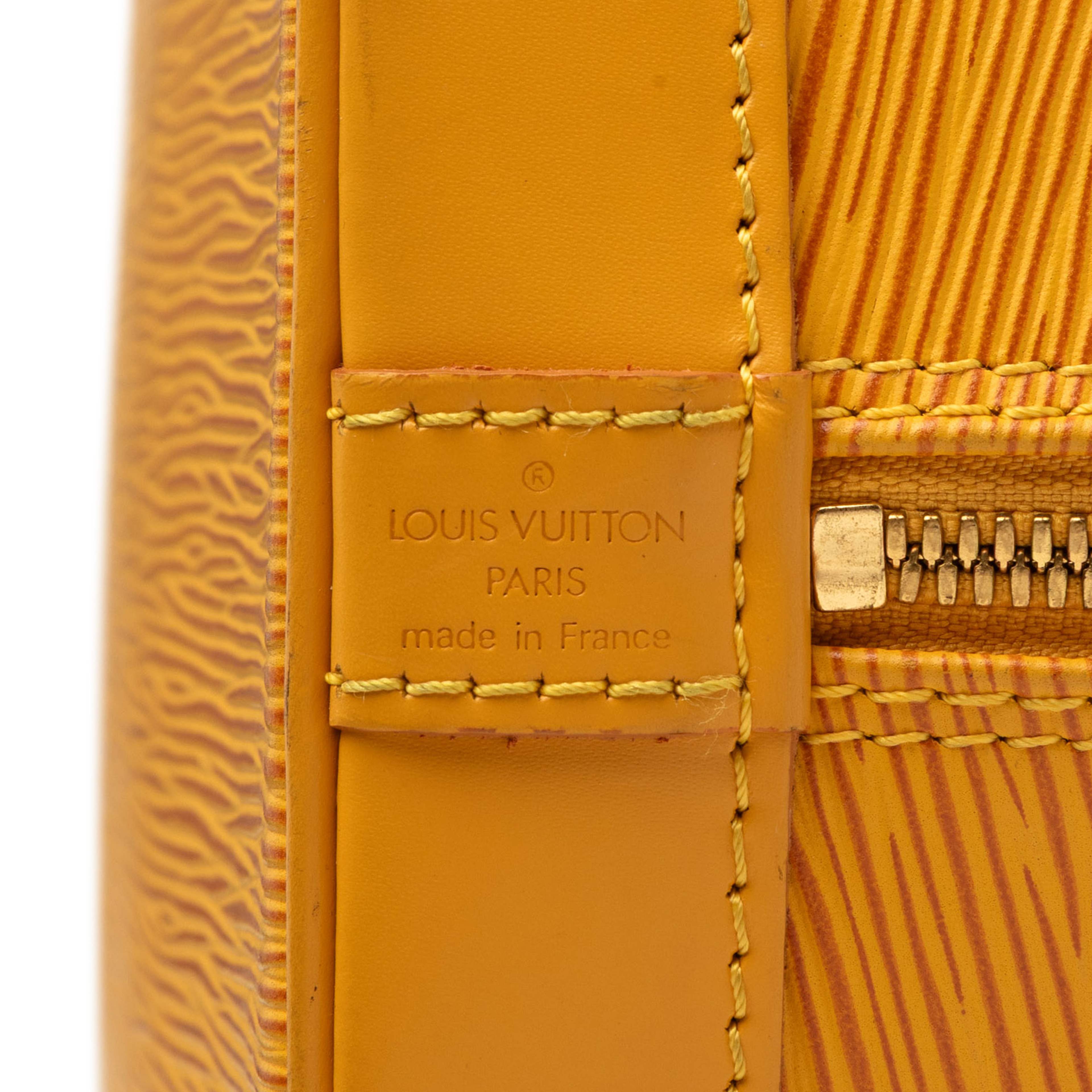 Louis Vuitton Epi Alma Pm, från Luxclusif, i färgen gul. Klicka för att öppna bilden i stort format