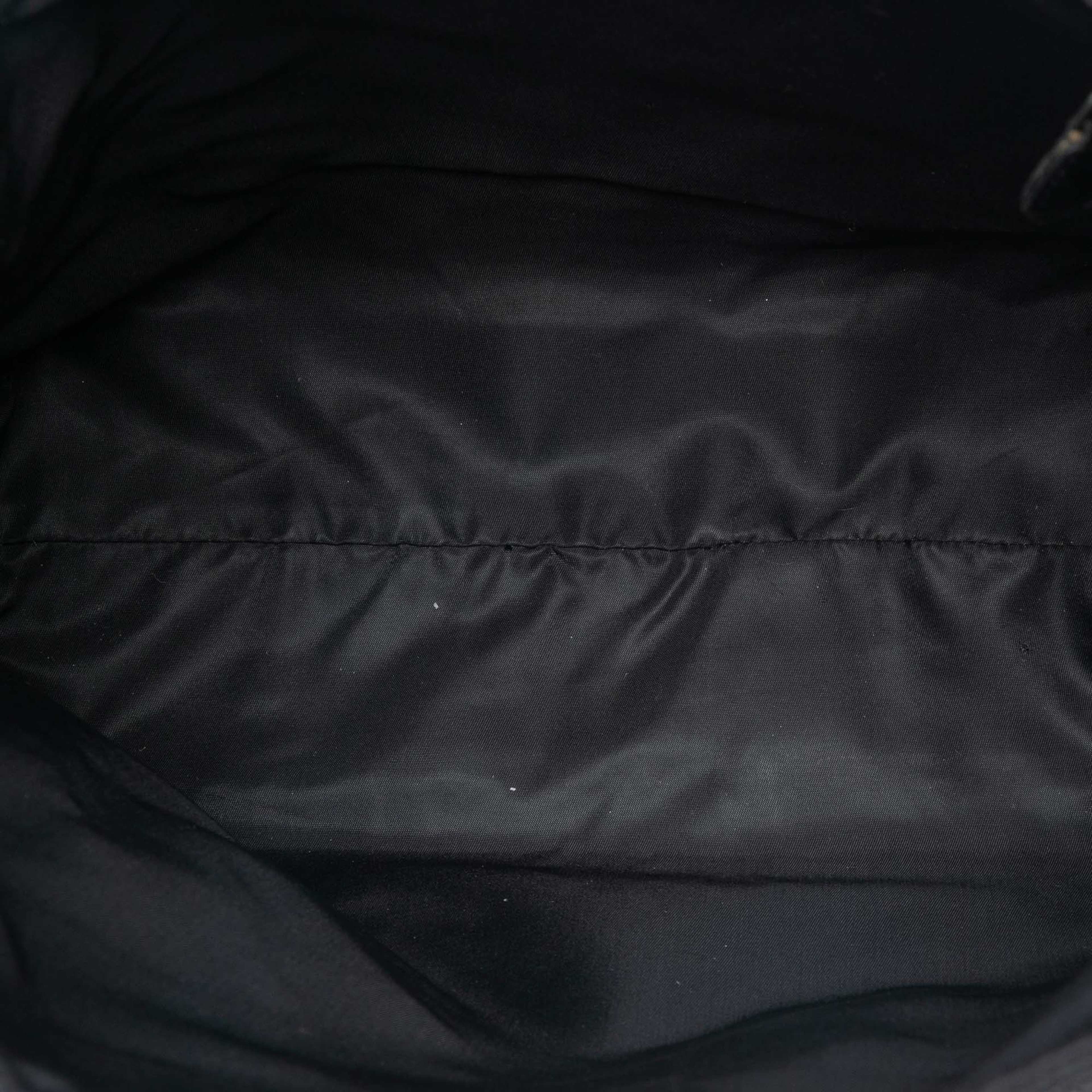 Dior Diorissimo Trotter Canvas Crossbody, från Luxclusif, i färgen black. Klicka för att öppna bilden i stort format