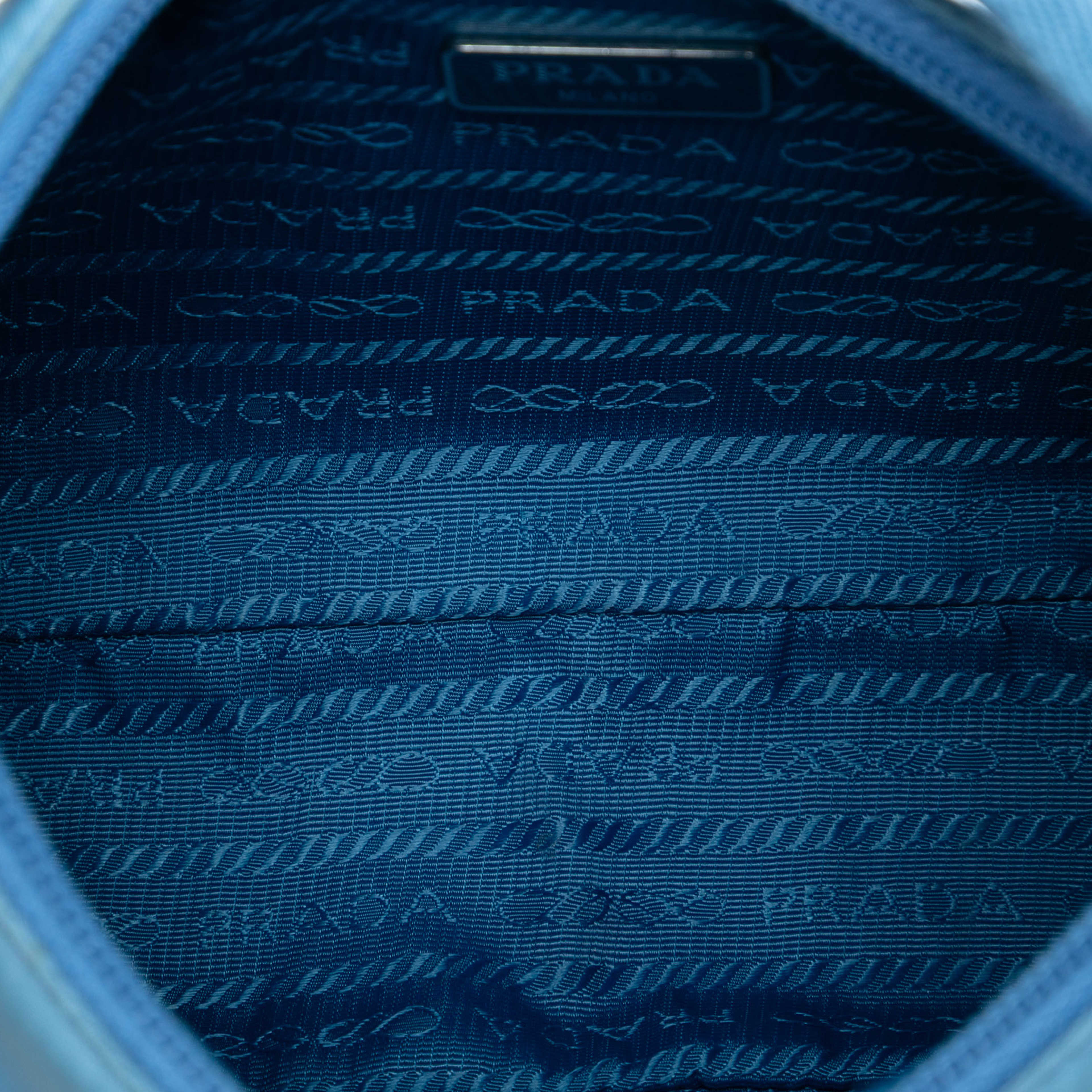 Prada Mini Tessuto Re Edition 2000 Shoulder Bag, från Luxclusif, i färgen light blue. Klicka för att öppna bilden i stort format