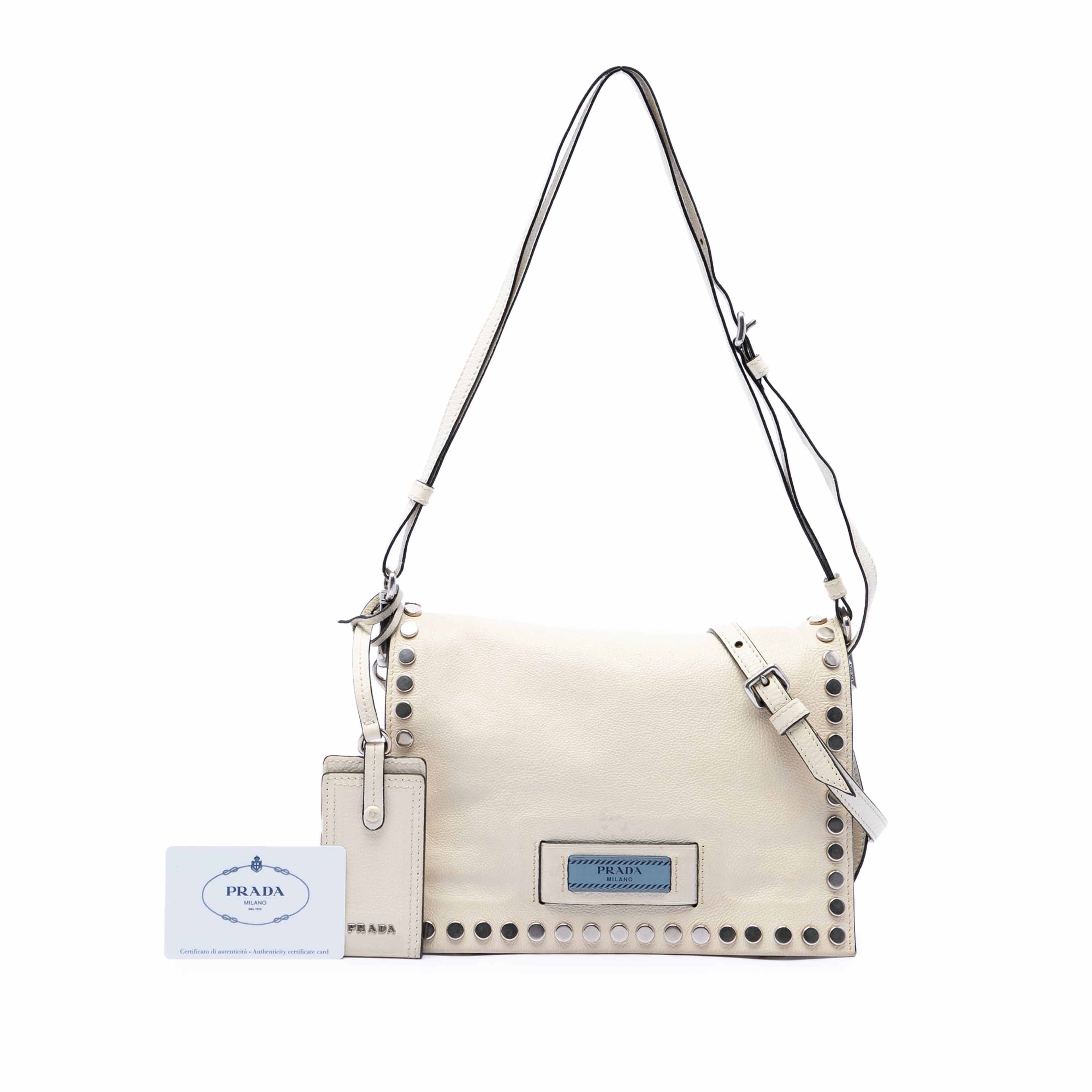 Prada Glace Calfskin Studded Etiquette Flap, från Luxclusif, i färgen vit. Klicka för att öppna bilden i stort format