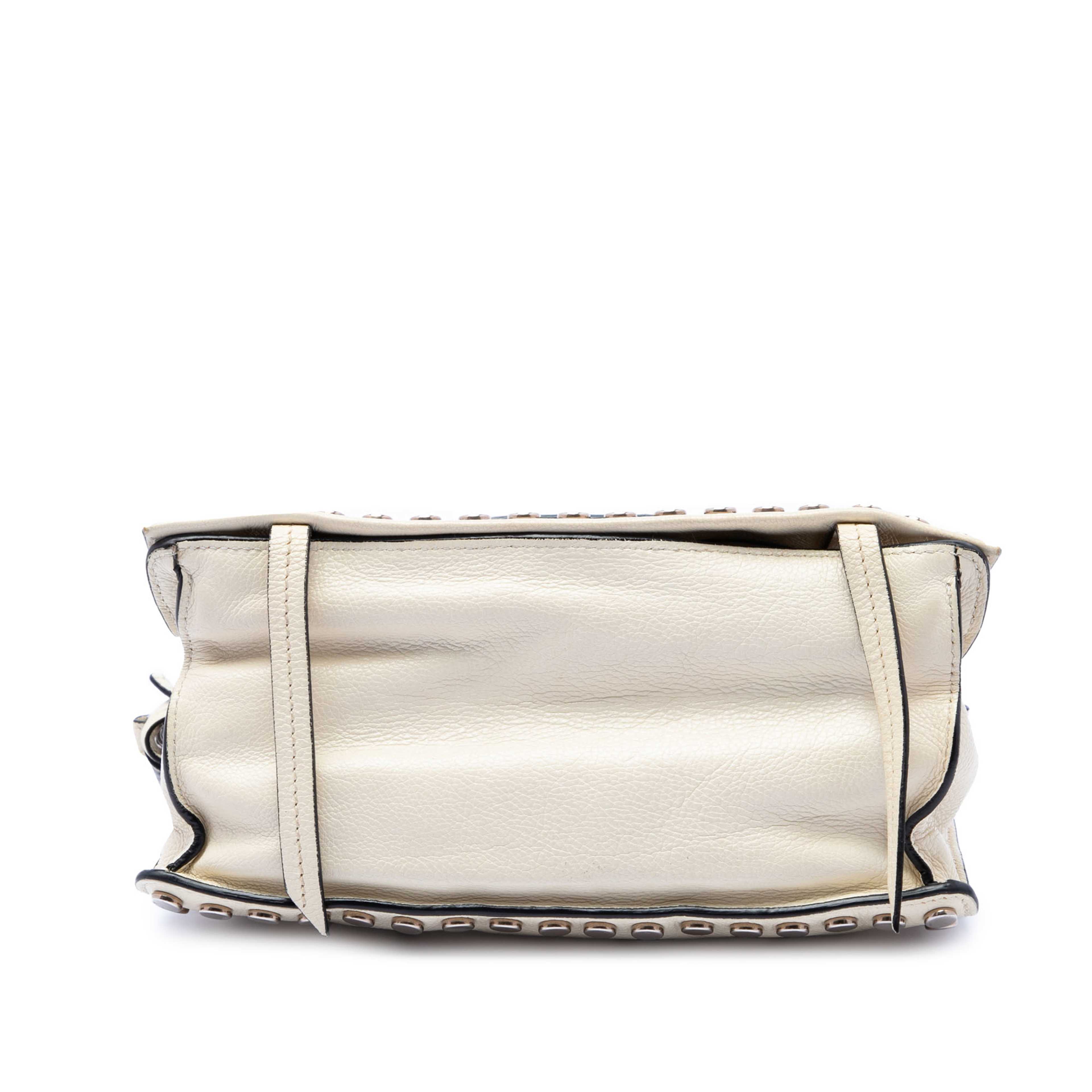 Prada Glace Calfskin Studded Etiquette Flap, från Luxclusif, i färgen vit. Klicka för att öppna bilden i stort format