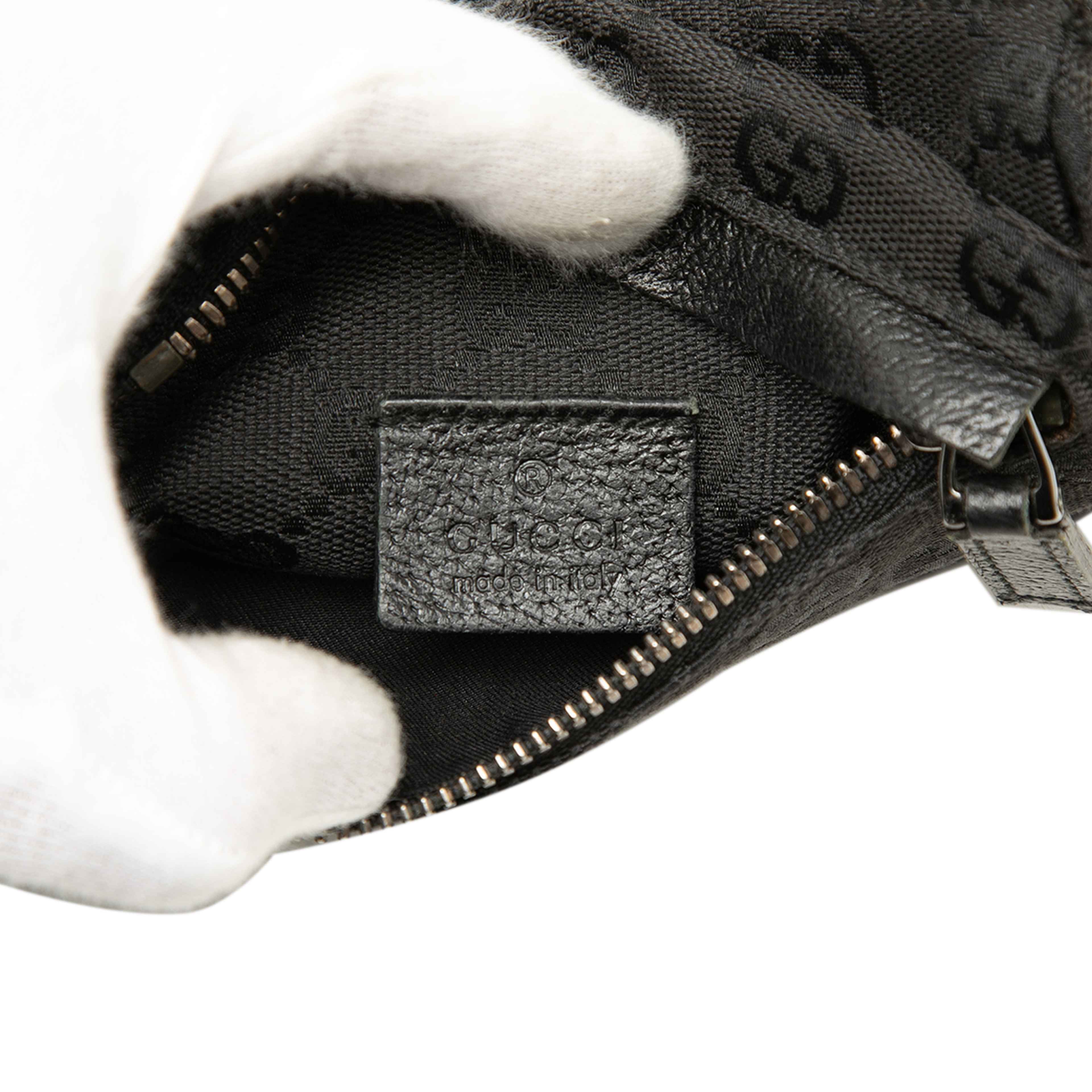 Gucci Gg Canvas Double Pocket Belt Bag, från Luxclusif, i färgen svart. Klicka för att öppna bilden i stort format