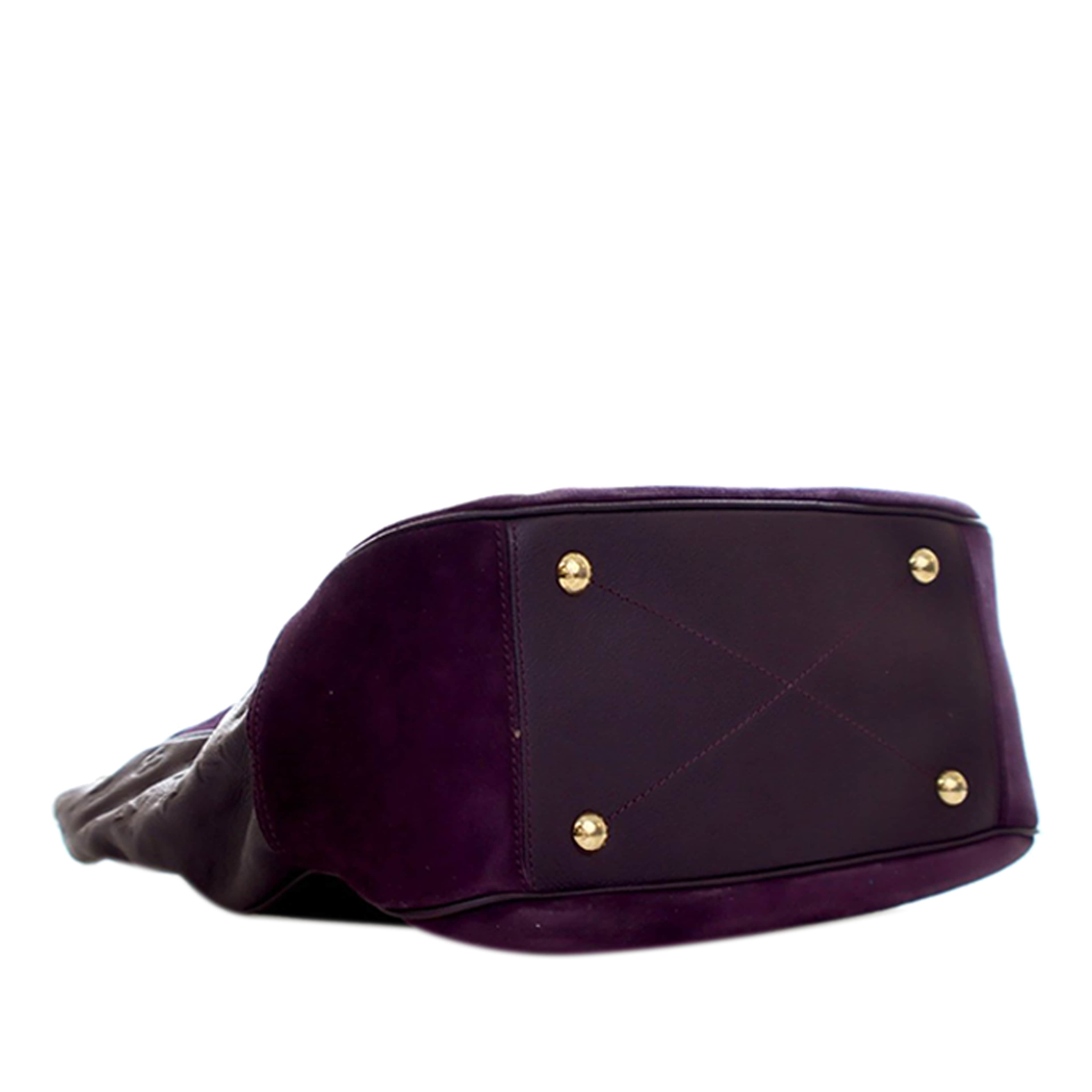 Louis Vuitton Monogram Empreinte Audacieuse Mm, från Luxclusif, i färgen purple. Klicka för att öppna bilden i stort format