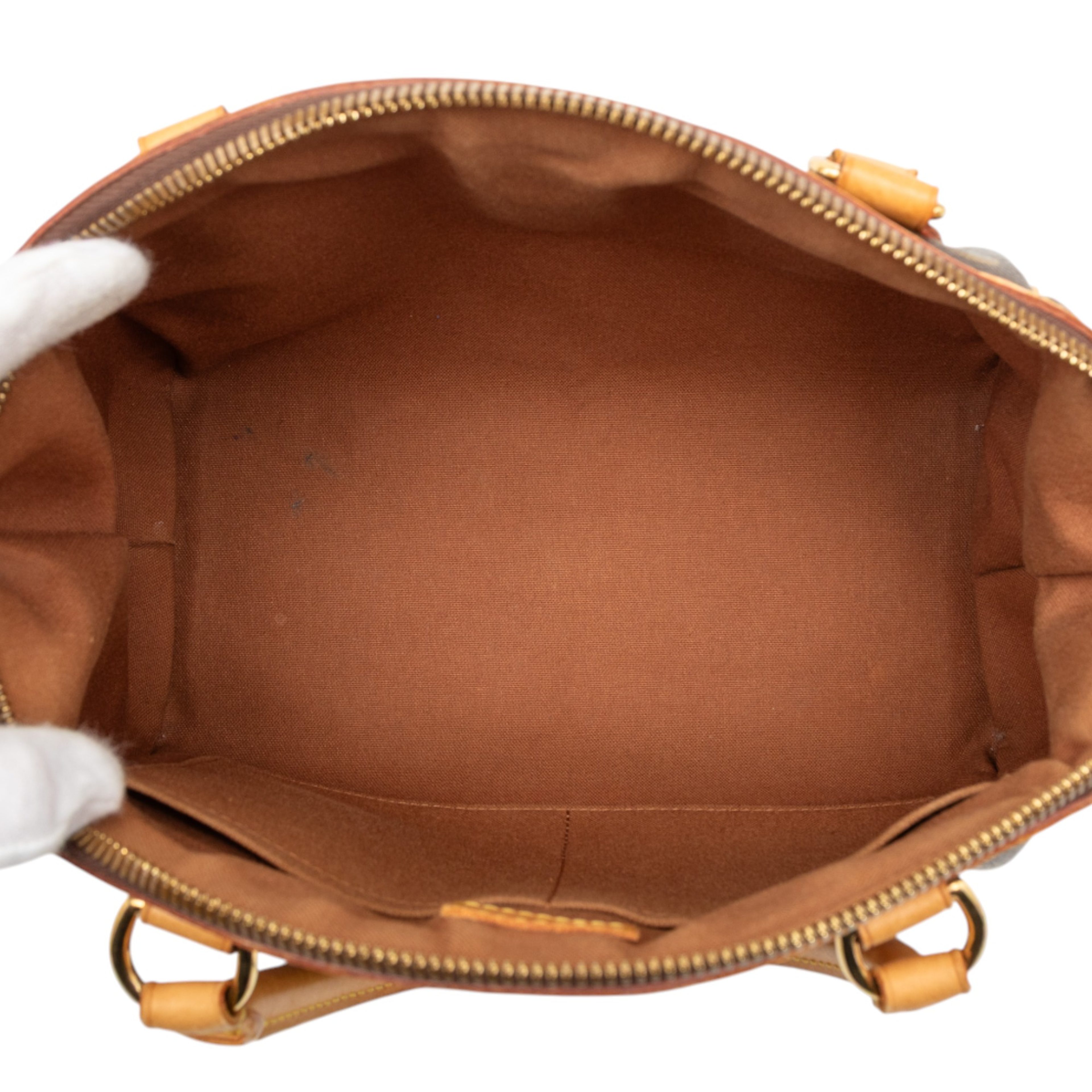 Louis Vuitton Monogram Tivoli Pm, från Luxclusif, i färgen brown. Klicka för att öppna bilden i stort format