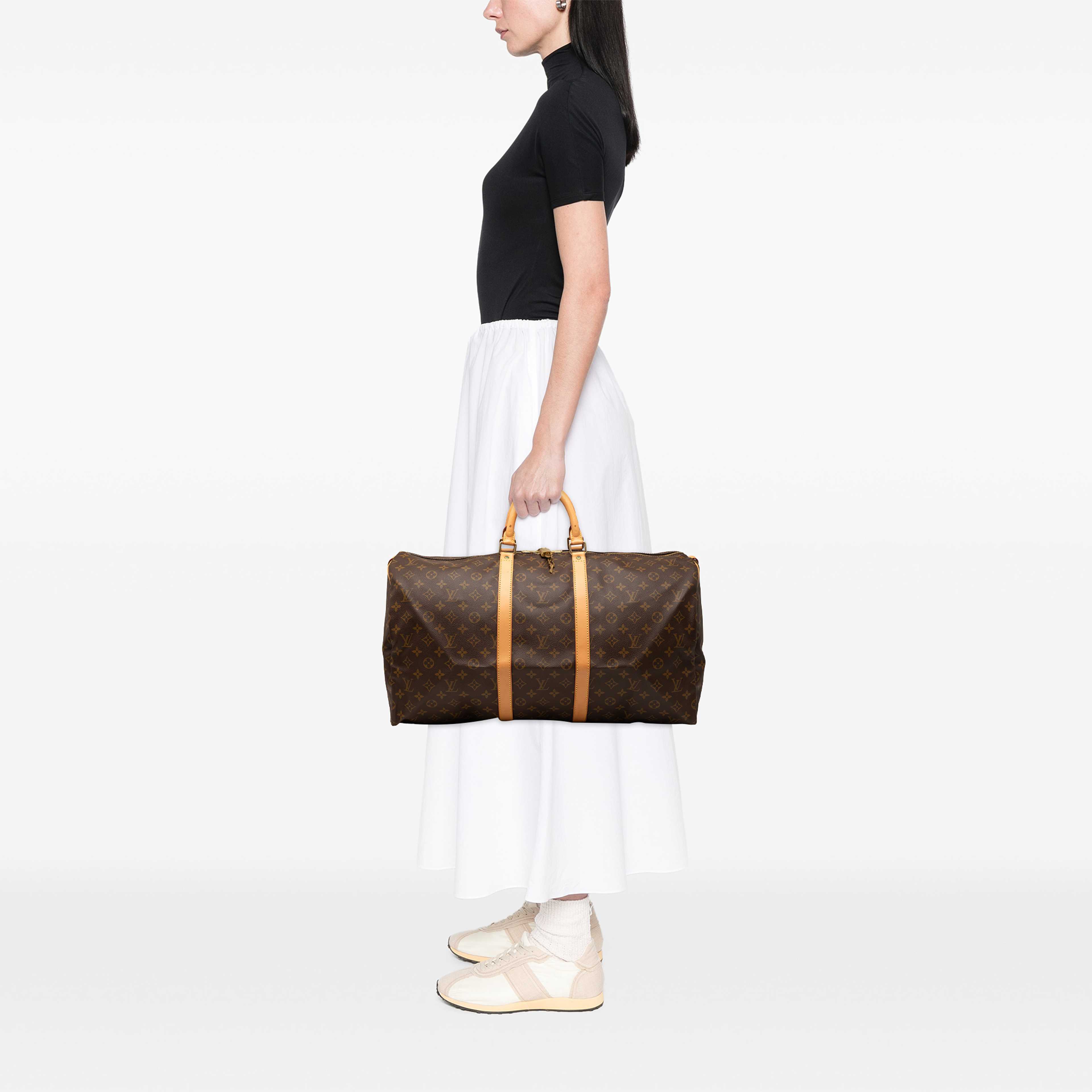Louis Vuitton Monogram Keepall 55, från Luxclusif, i färgen brun. Klicka för att öppna bilden i stort format