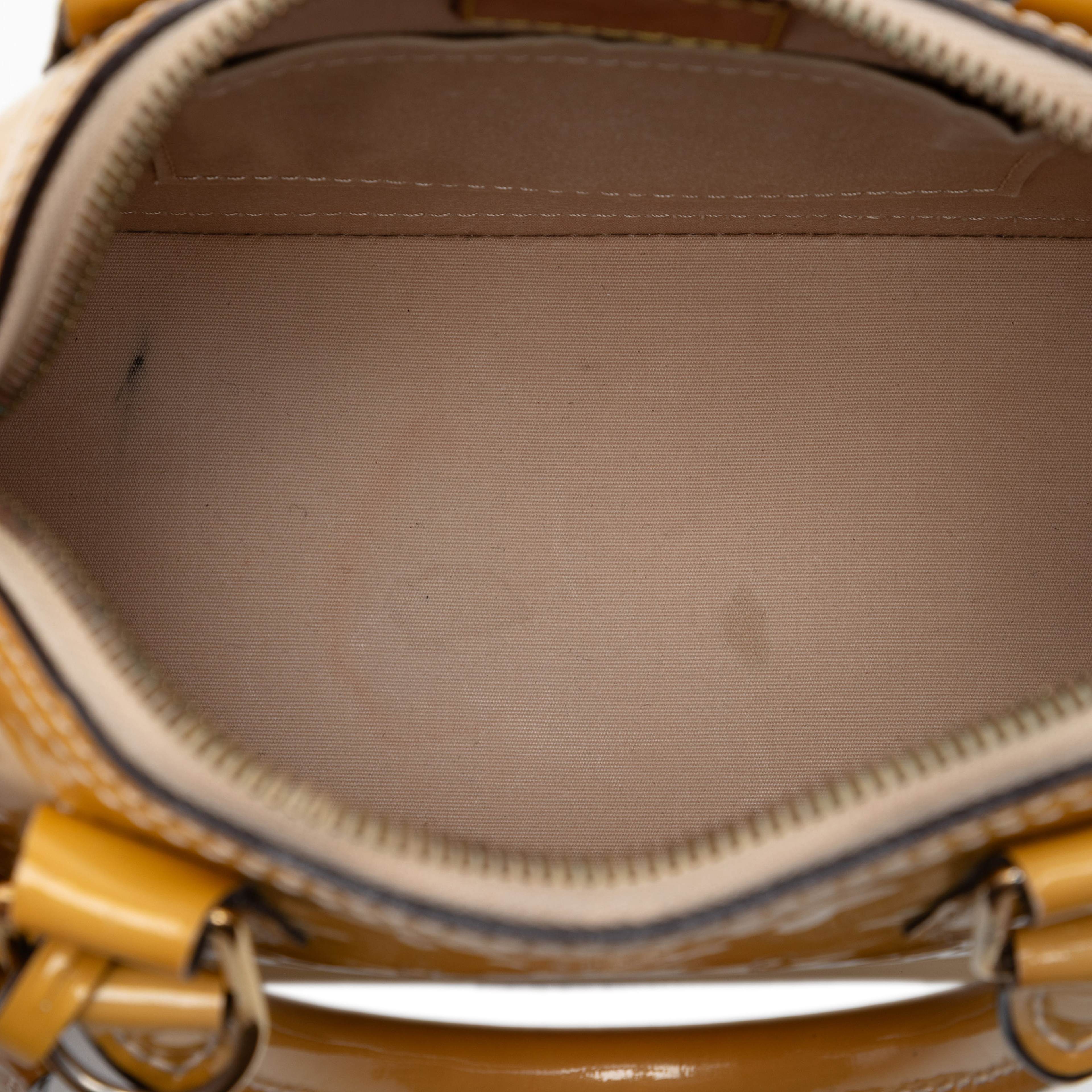 Louis Vuitton Monogram Vernis Alma Bb, från Luxclusif, i färgen yellow. Klicka för att öppna bilden i stort format