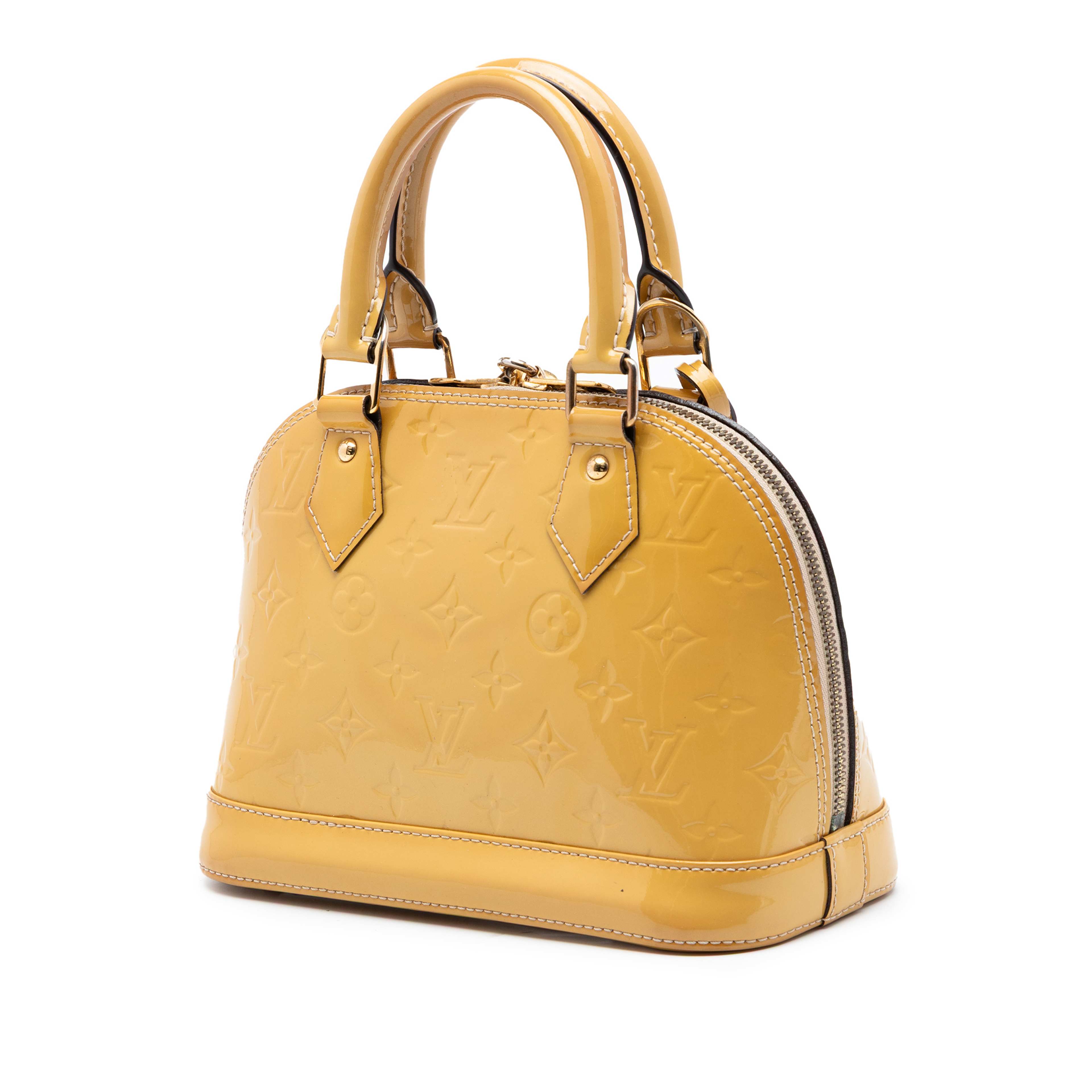 Louis Vuitton Monogram Vernis Alma Bb, från Luxclusif, i färgen yellow. Klicka för att öppna bilden i stort format