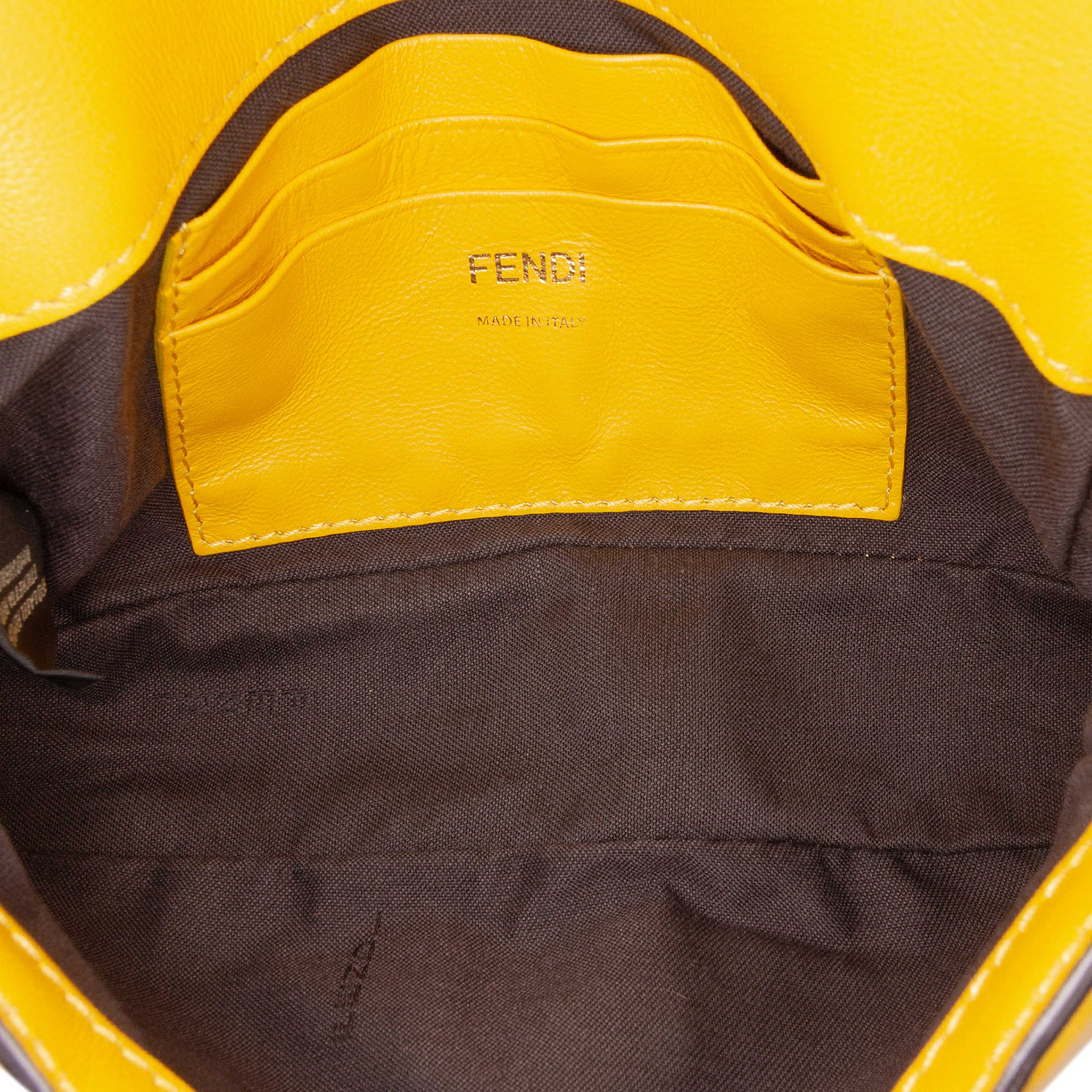 Fendi Mini Zucca Embossed Leather Baguette Satchel, från Luxclusif, i färgen mustard. Klicka för att öppna bilden i stort format