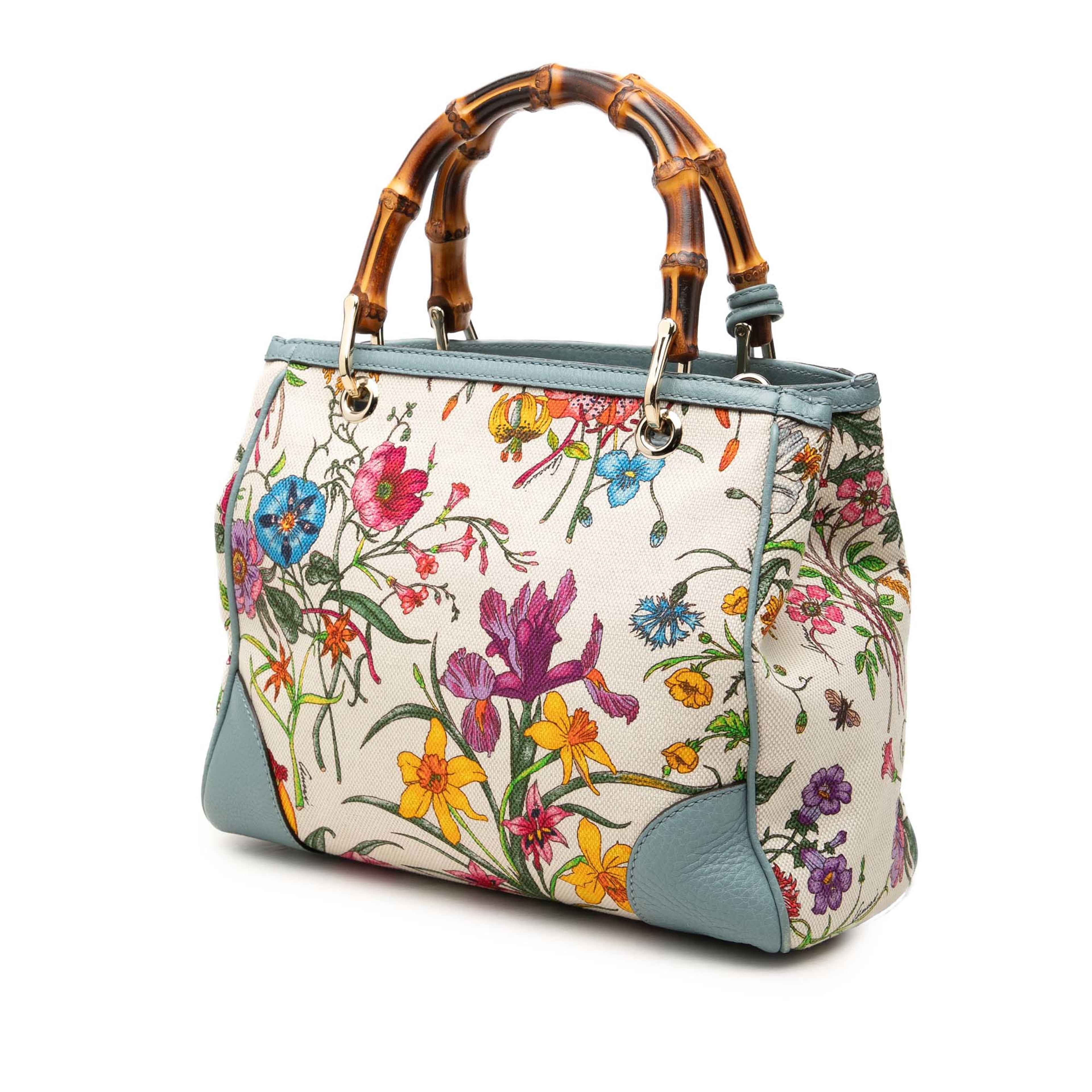 Gucci Small Canvas Flora Bamboo Shopper Satchel, från Luxclusif, i färgen vit. Klicka för att öppna bilden i stort format