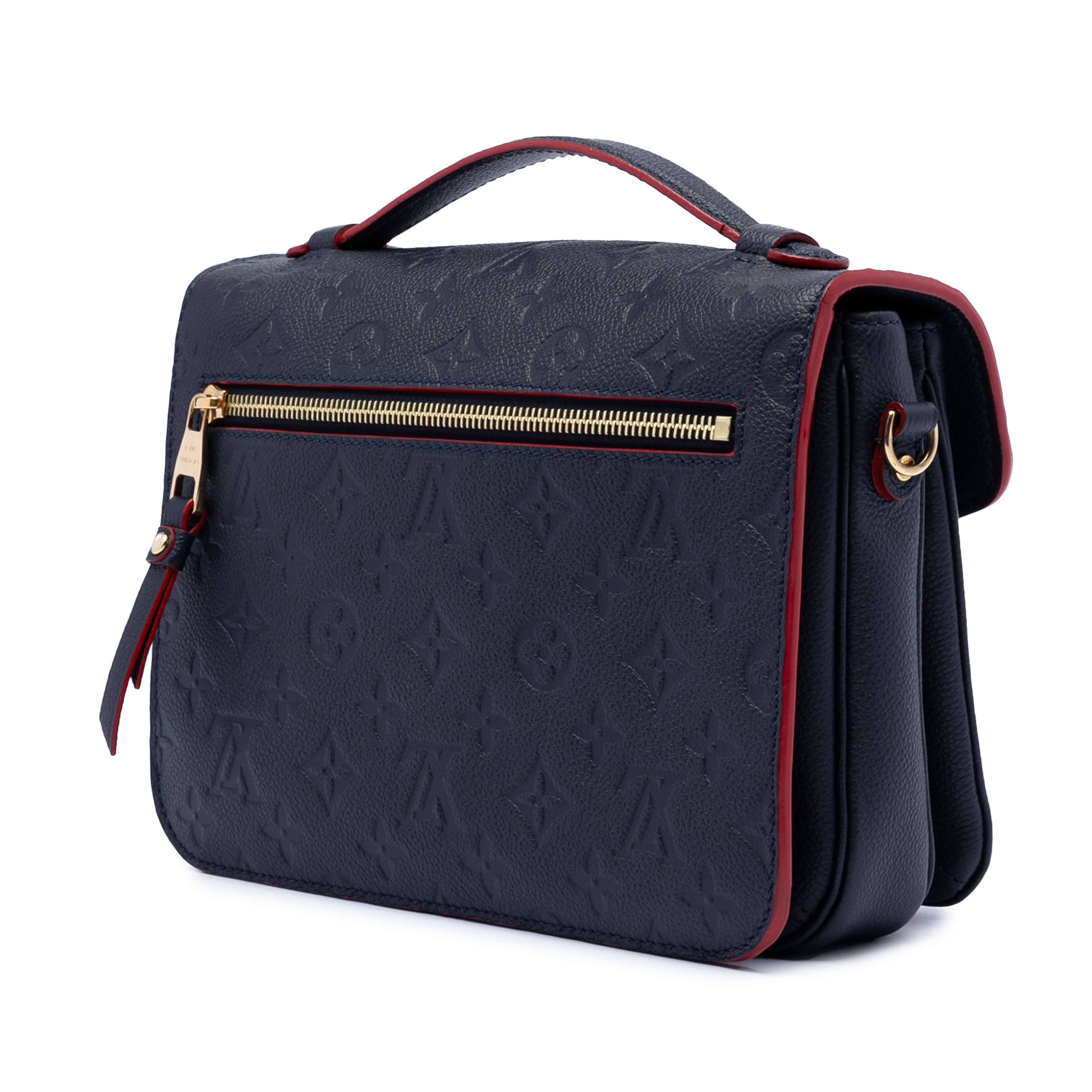 Louis Vuitton Monogram Empreinte Pochette Metis, från Luxclusif, i färgen navy. Klicka för att öppna bilden i stort format
