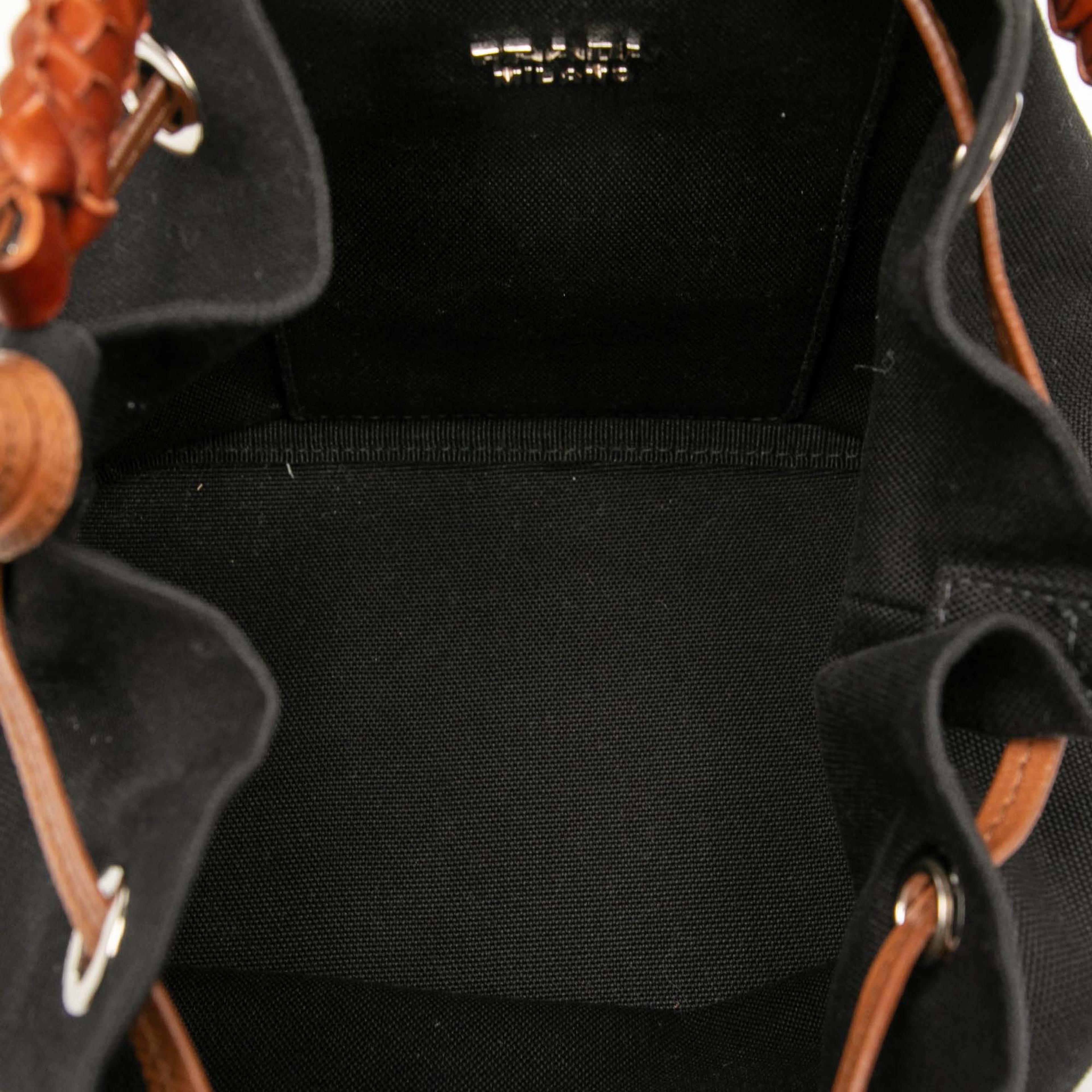 Prada Canvas Canapa Logo Bucket Bag, från Luxclusif, i färgen black. Klicka för att öppna bilden i stort format