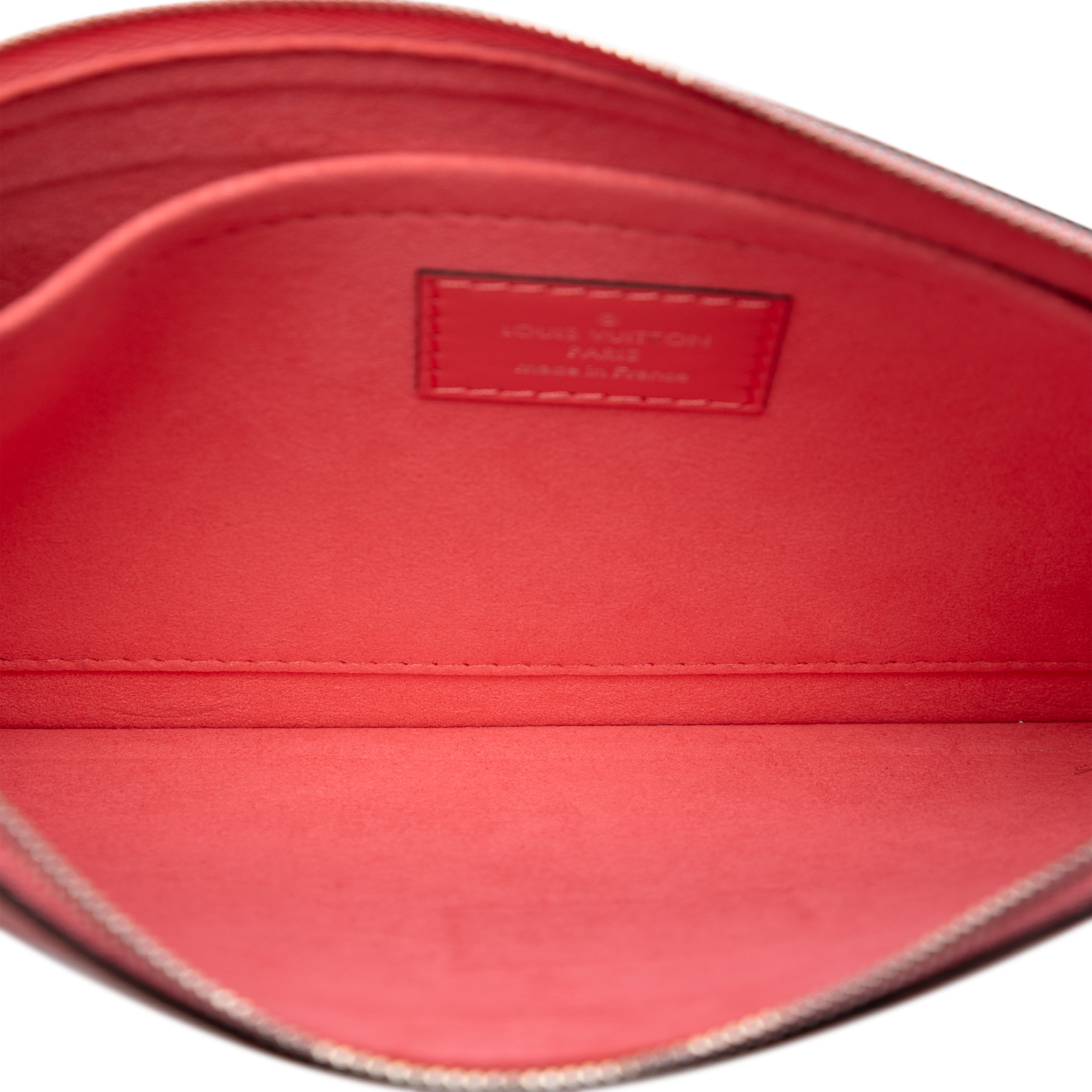 Louis Vuitton Epi Neverfull Pouch, från Luxclusif, i färgen pink. Klicka för att öppna bilden i stort format