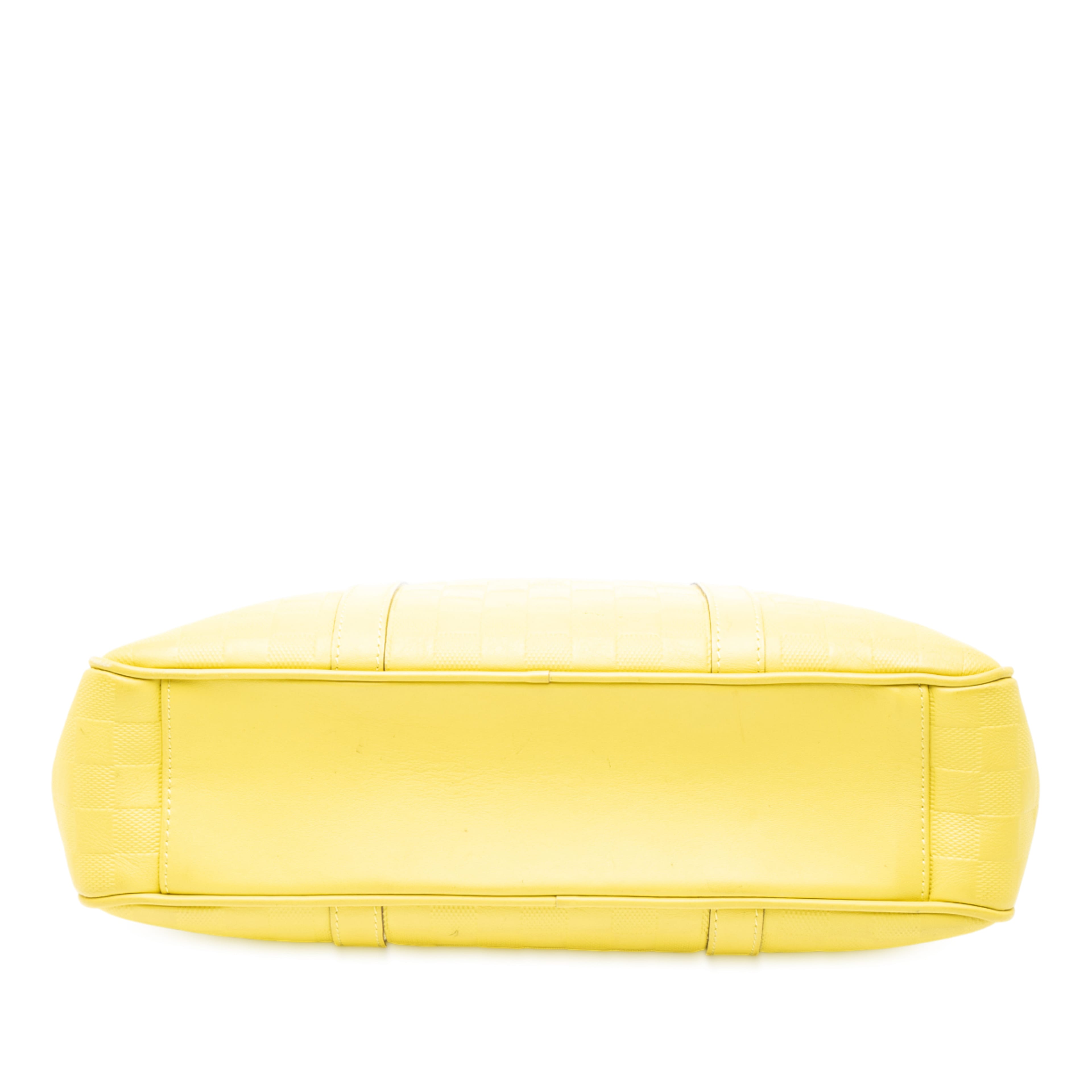 Louis Vuitton Damier Infini Tadao, från Luxclusif, i färgen gul. Klicka för att öppna bilden i stort format