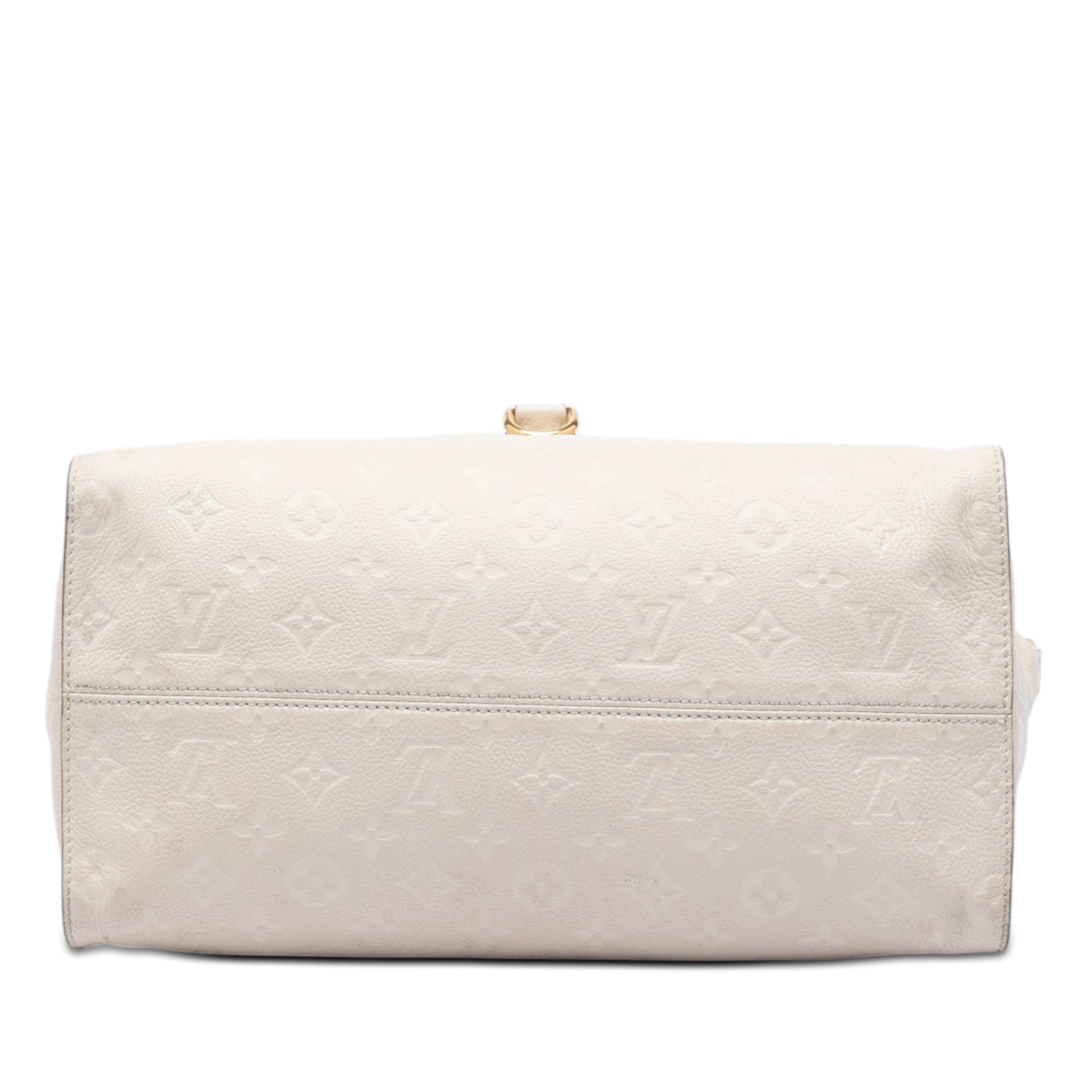Louis Vuitton Monogram Empreinte Lumineuse Pm, från Luxclusif, i färgen beige. Klicka för att öppna bilden i stort format