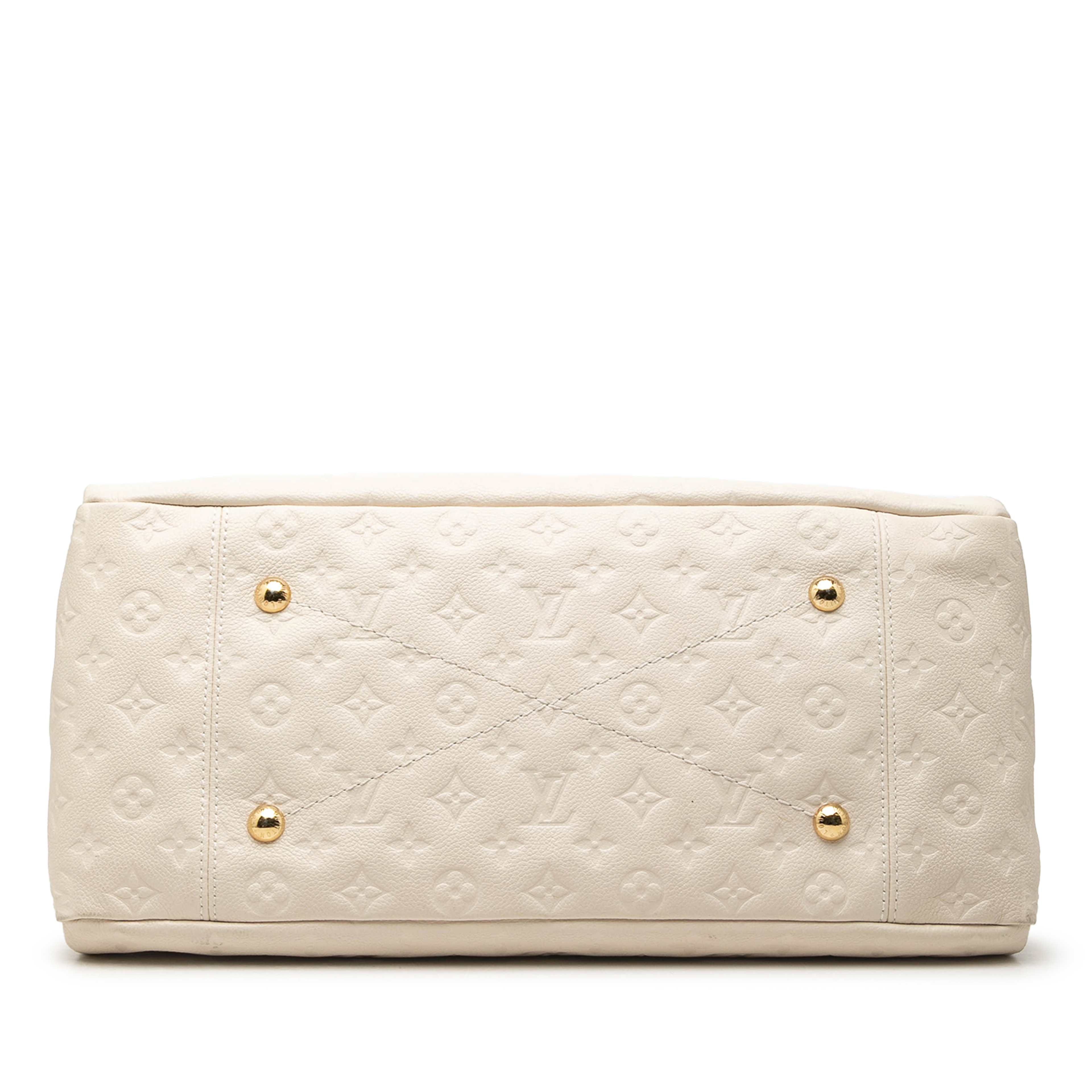 Louis Vuitton Monogram Empreinte Artsy Mm, från Luxclusif, i färgen white. Klicka för att öppna bilden i stort format