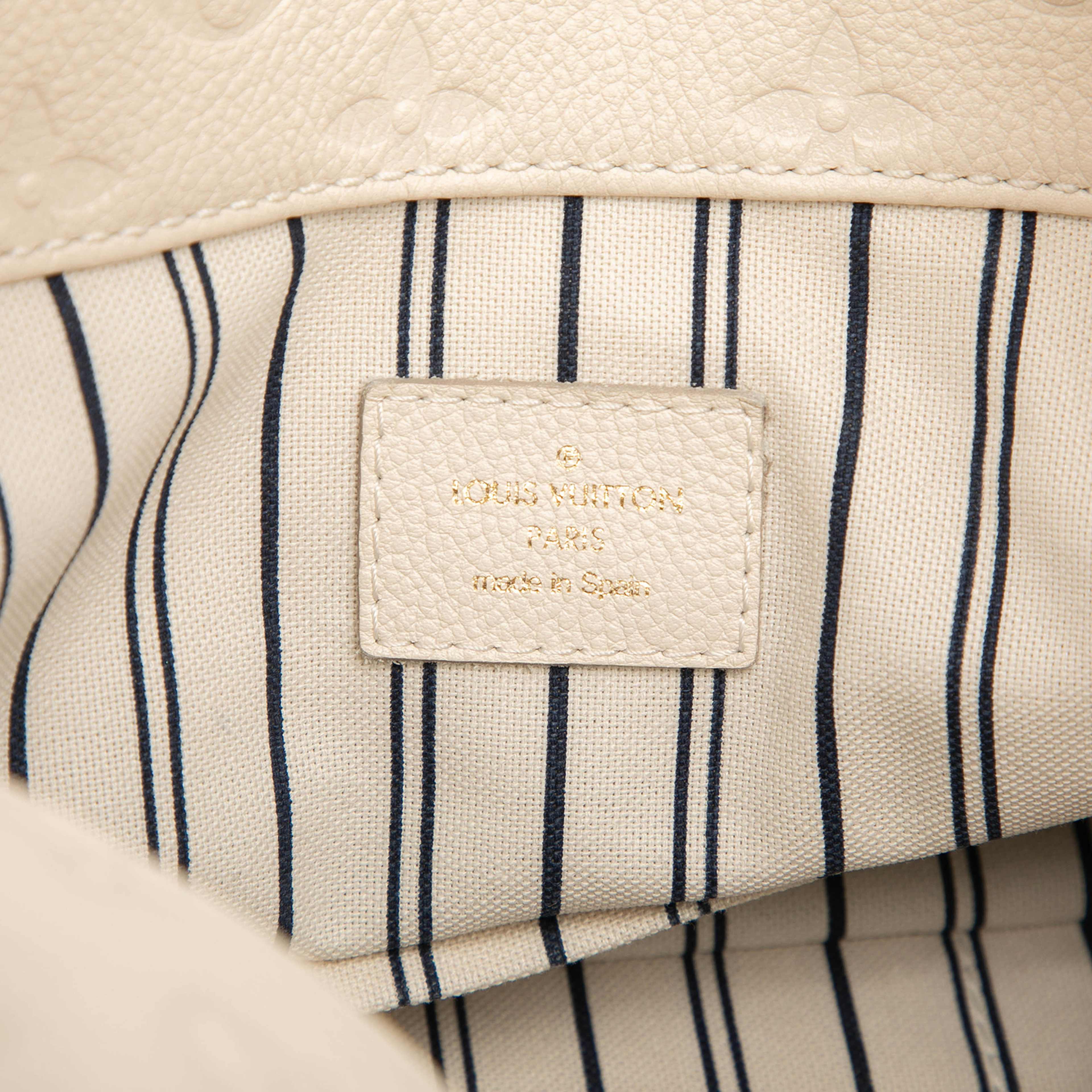 Louis Vuitton Monogram Empreinte Artsy Mm, från Luxclusif, i färgen white. Klicka för att öppna bilden i stort format