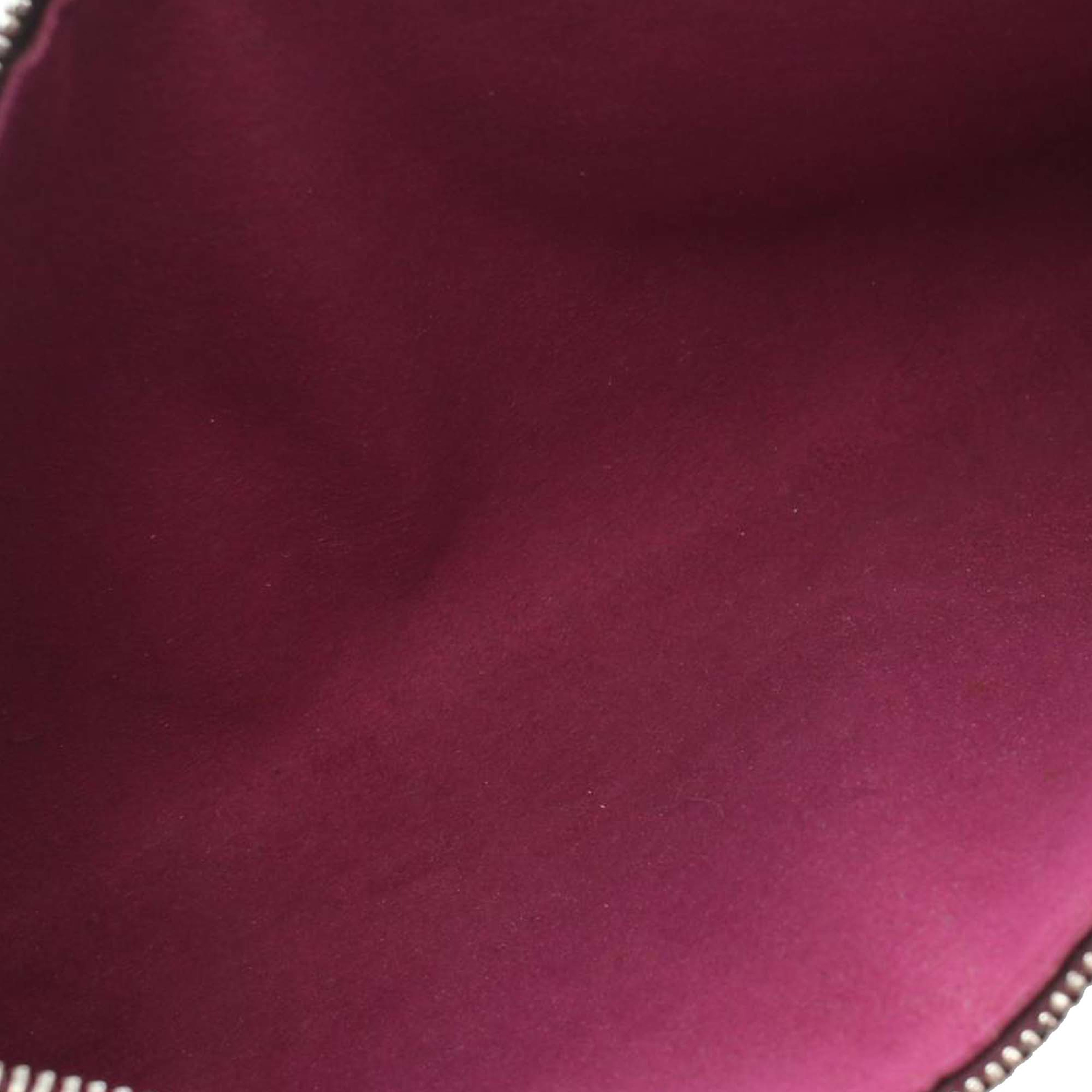 Louis Vuitton Epi Pochette Accessoires, från Luxclusif, i färgen purple. Klicka för att öppna bilden i stort format