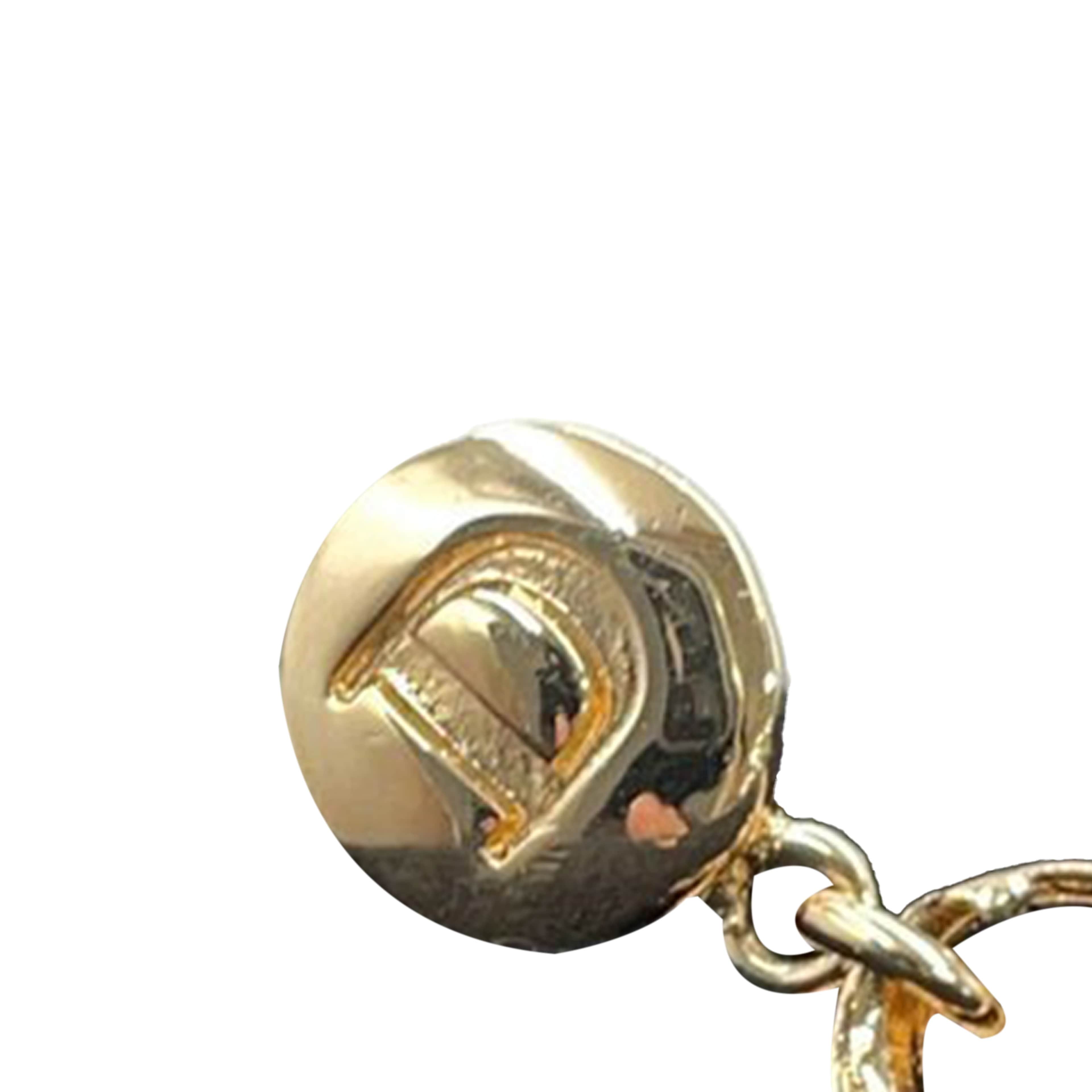 Dior Gold Plated Saddlebag Drop Bullet Back Earrings, från Luxclusif, i färgen gold. Klicka för att öppna bilden i stort format