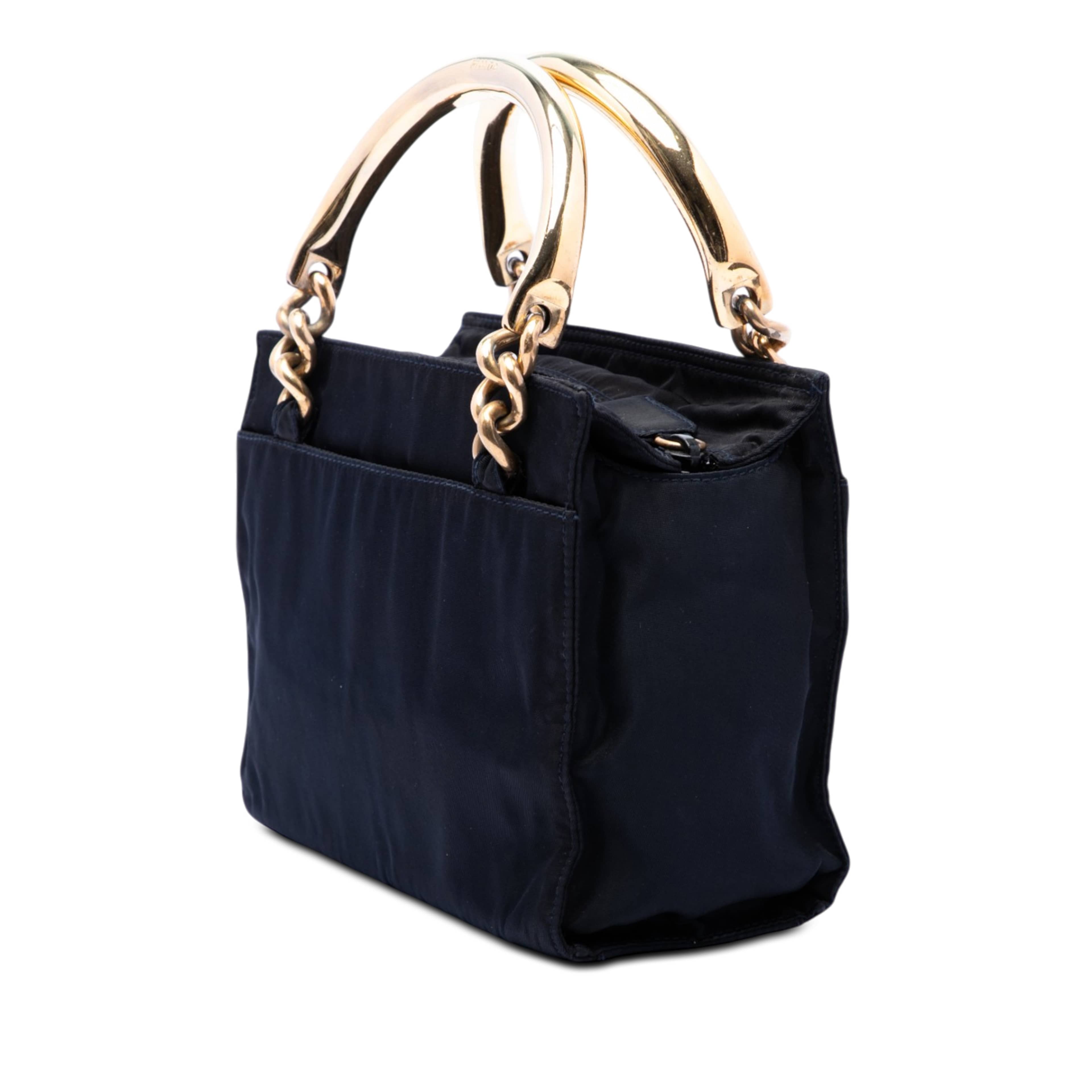 Prada Tessuto Metal Handle Bag, från Luxclusif, i färgen blå. Klicka för att öppna bilden i stort format