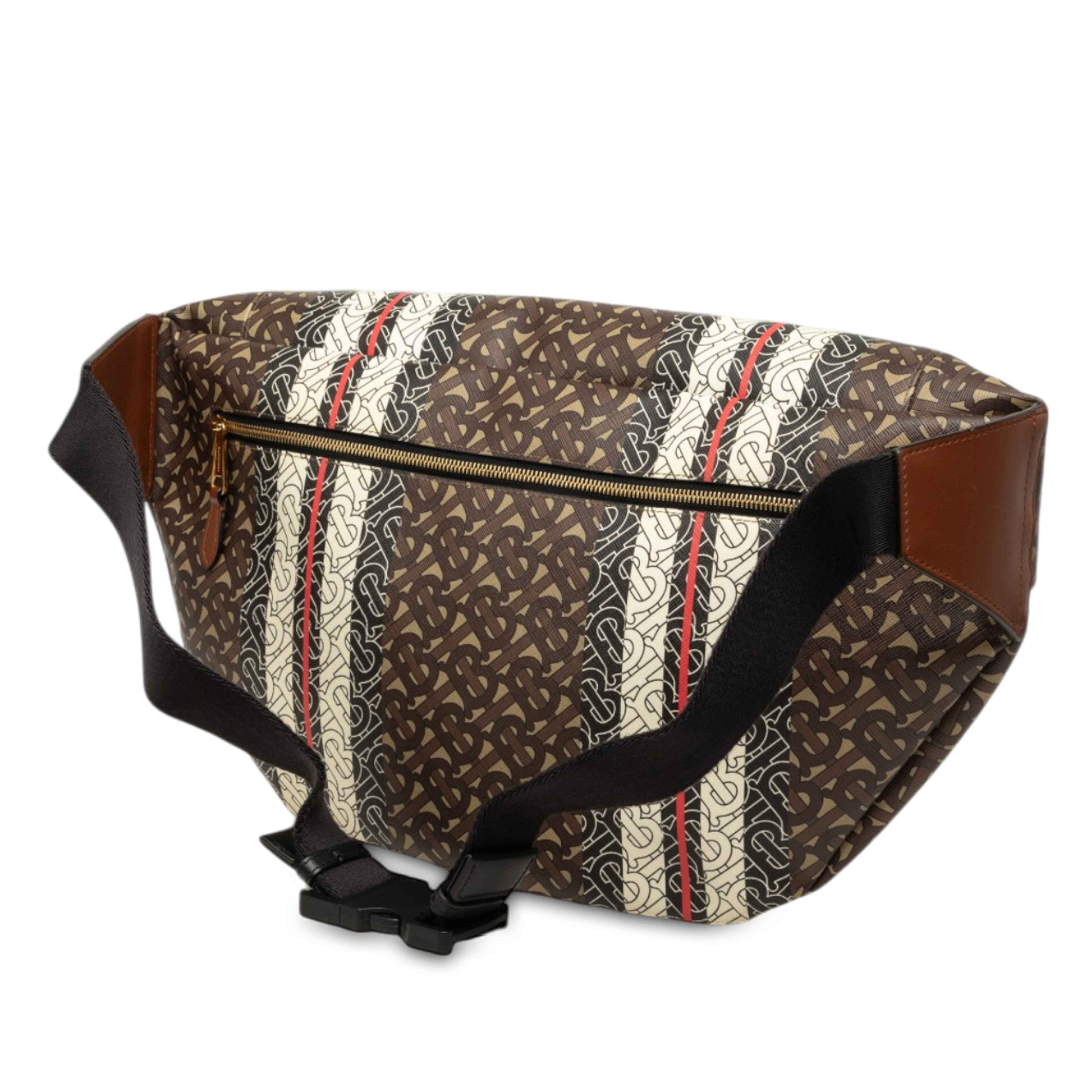 Burberry Extra Large Tb Monogram E-canvas Stripe Belt Bag, från Luxclusif, i färgen brun. Klicka för att öppna bilden i stort format