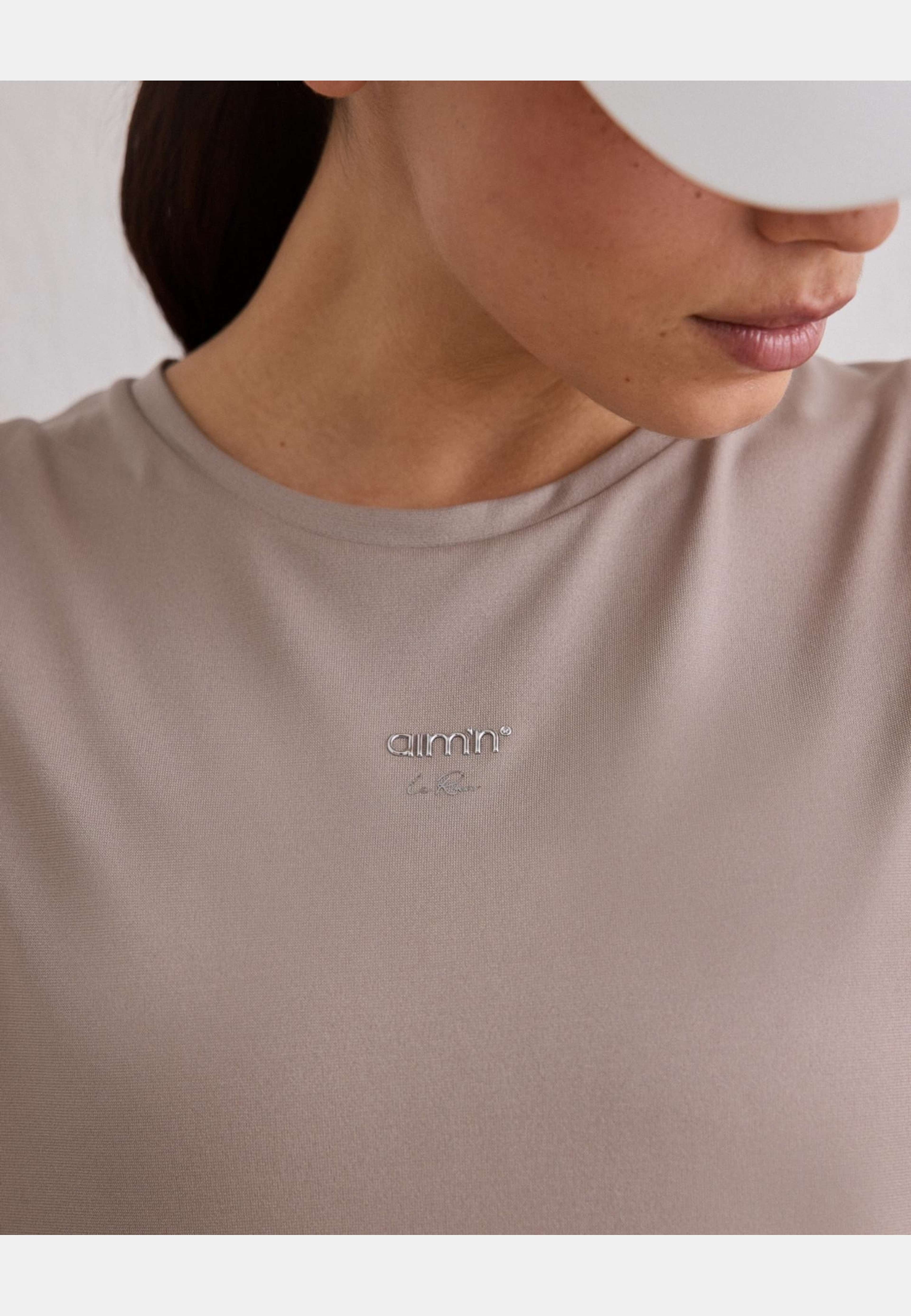 Seamless Running Top, från aim'n, i färgen dark clay. Klicka för att öppna bilden i stort format