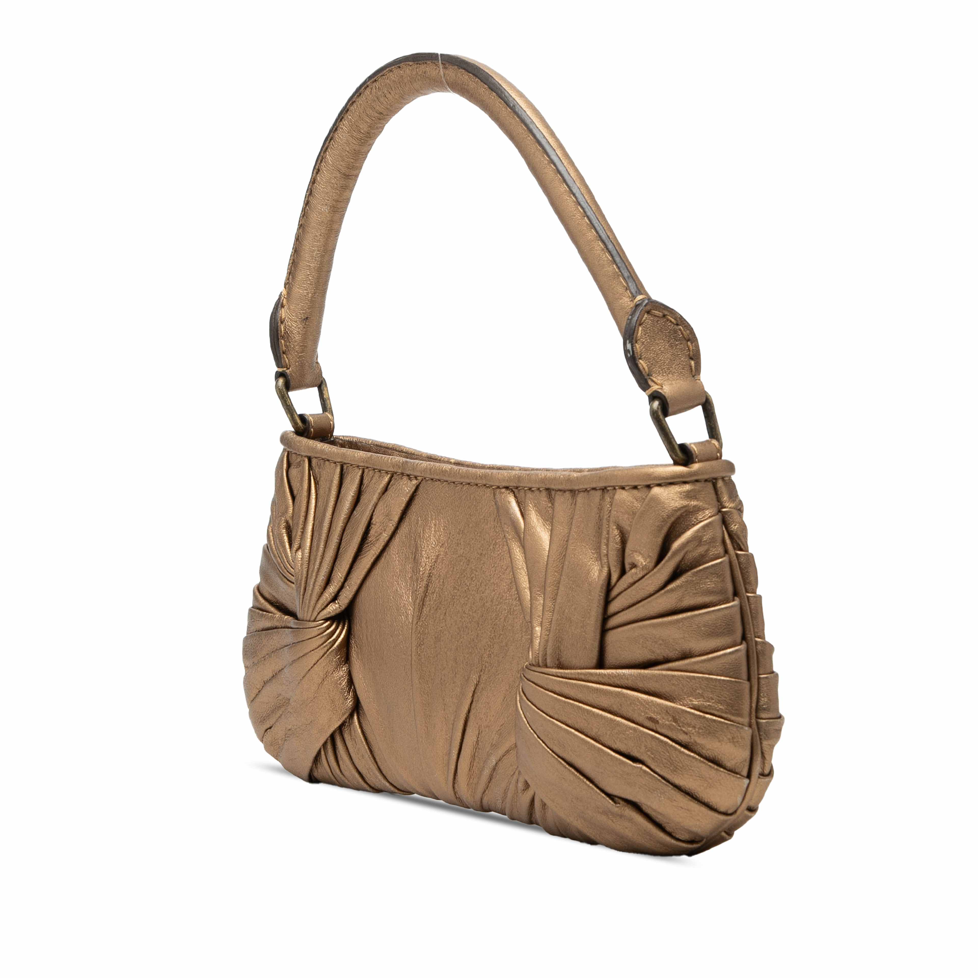 Burberry Metallic Leather Sling Knot Shoulder Bag, från Luxclusif, i färgen guld. Klicka för att öppna bilden i stort format