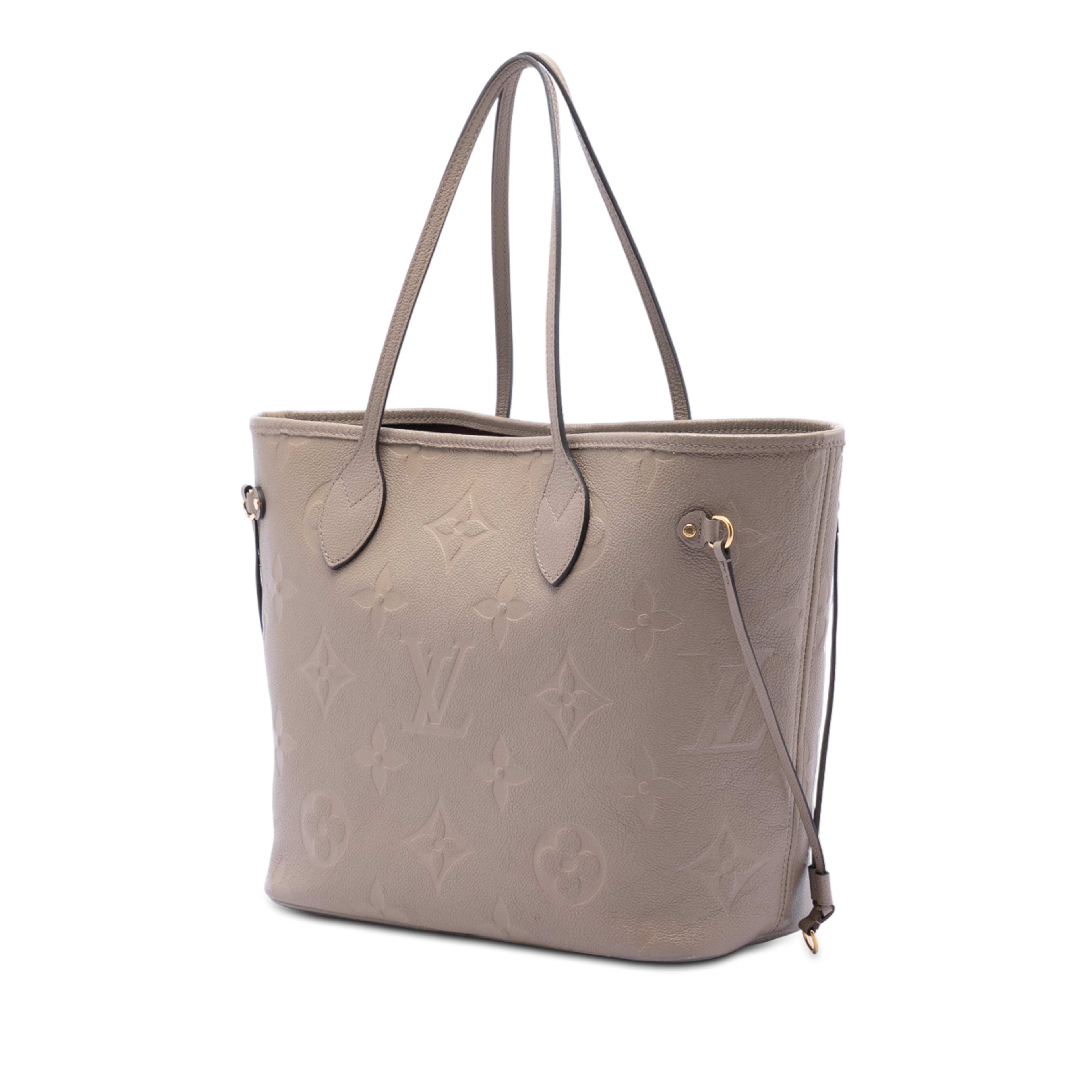 Louis Vuitton Monogram Giant Empreinte Neverfull Mm, från Luxclusif, i färgen beige. Klicka för att öppna bilden i stort format