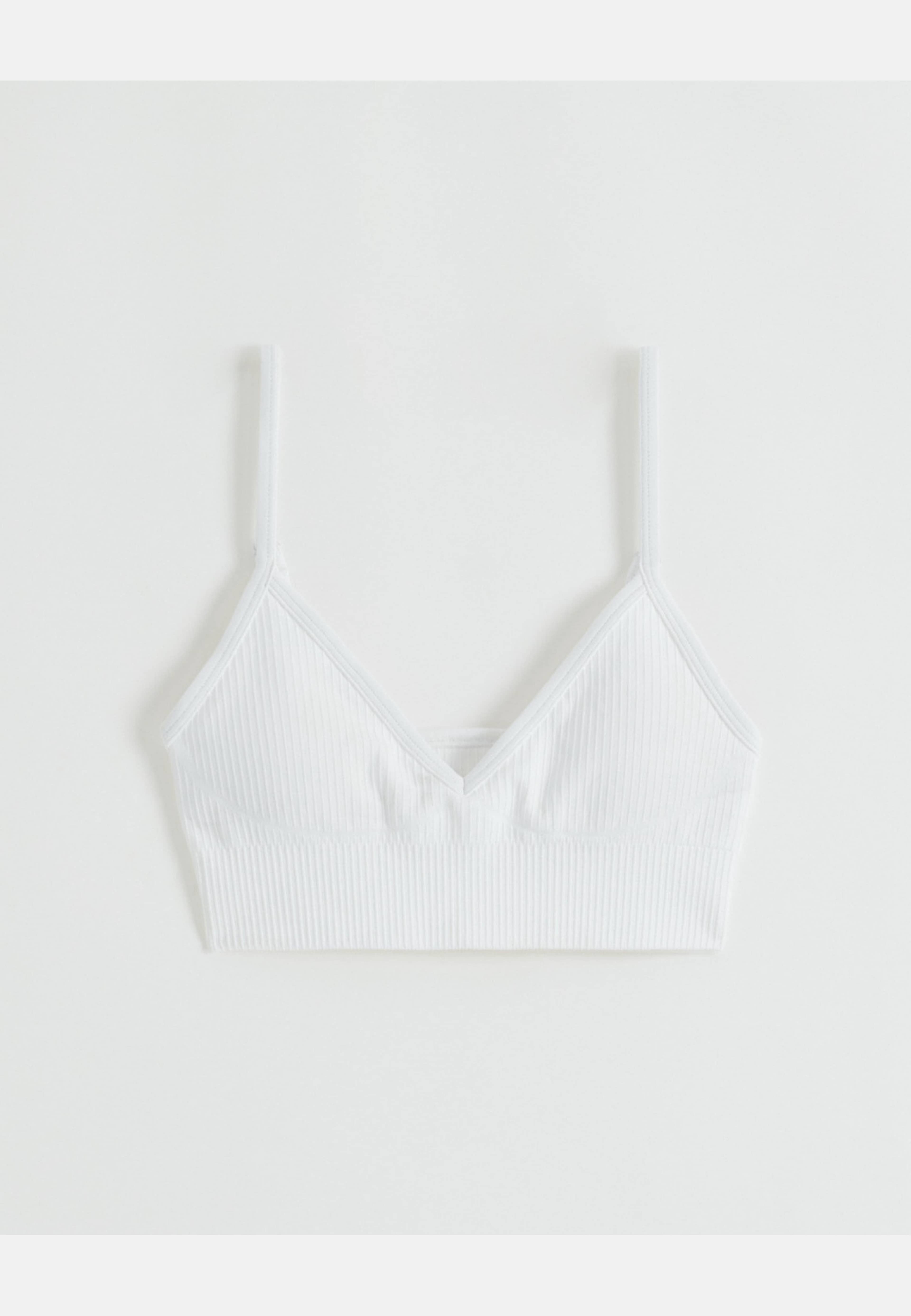 Ribbed Seamless Deep Cut Bra, från aim'n, i färgen white. Klicka för att öppna bilden i stort format