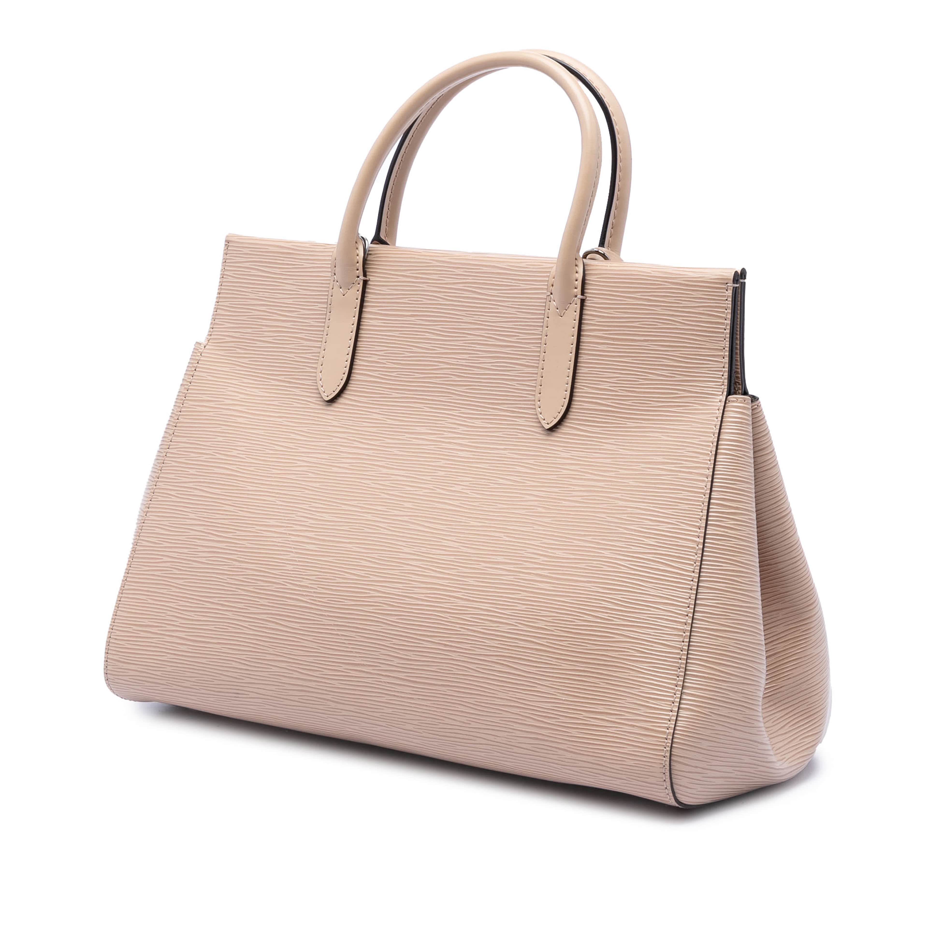 Louis Vuitton Epi Marly Mm, från Luxclusif, i färgen beige. Klicka för att öppna bilden i stort format