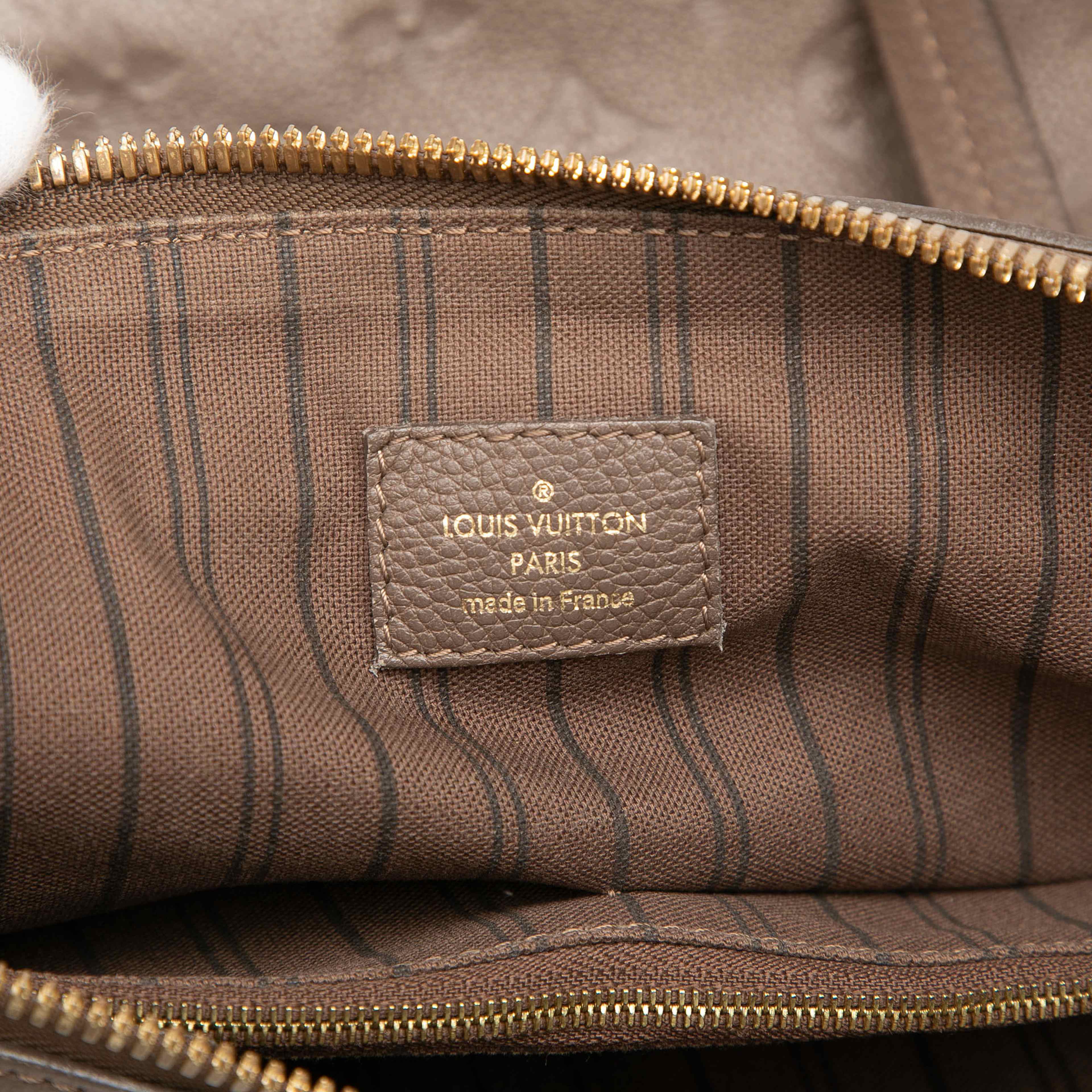 Louis Vuitton Monogram Empreinte Lumineuse Pm, från Luxclusif, i färgen brun. Klicka för att öppna bilden i stort format