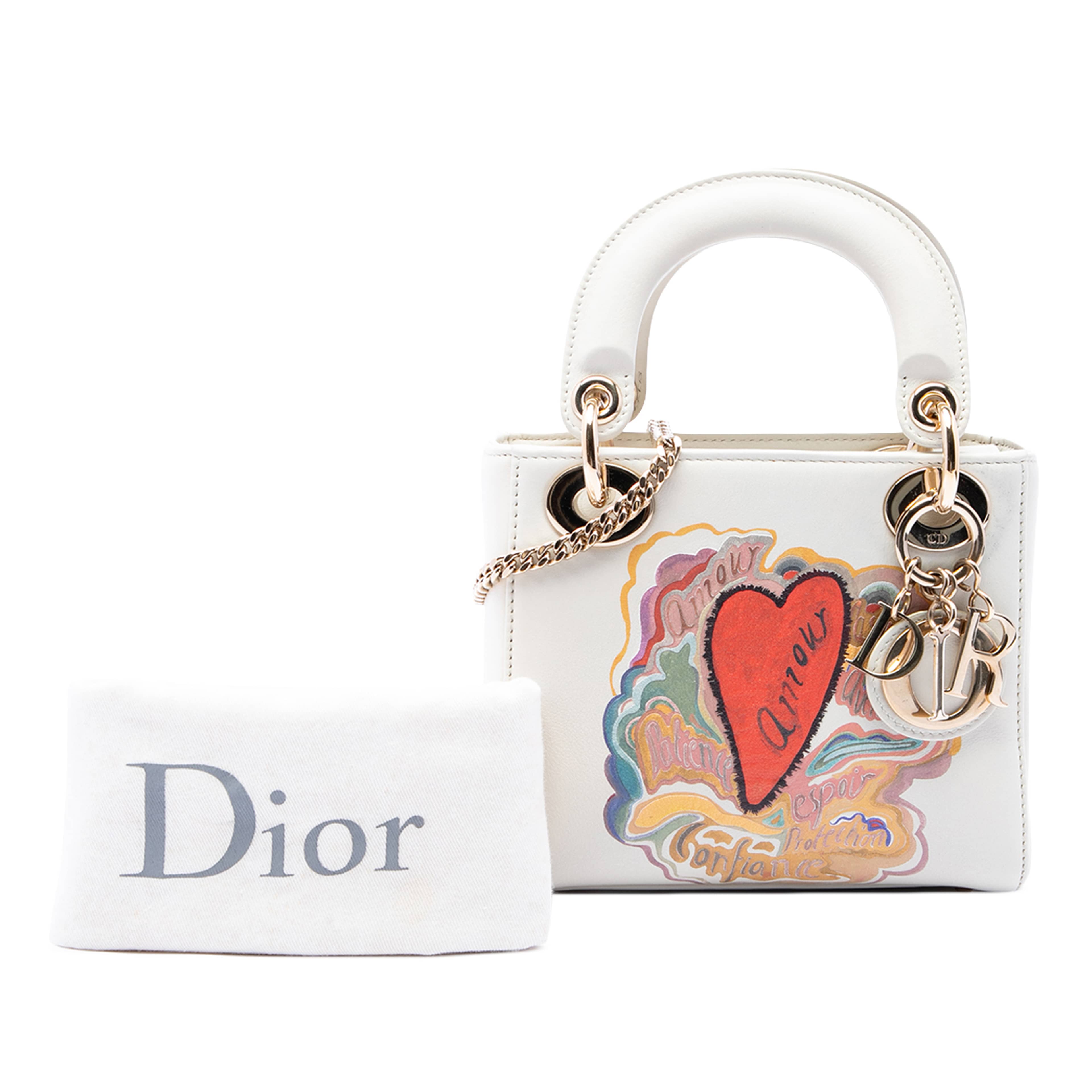 Dior Dioramour Niki De Saint Phalle Mini Calfskin Lady Dior, från Luxclusif, i färgen vit. Klicka för att öppna bilden i stort format