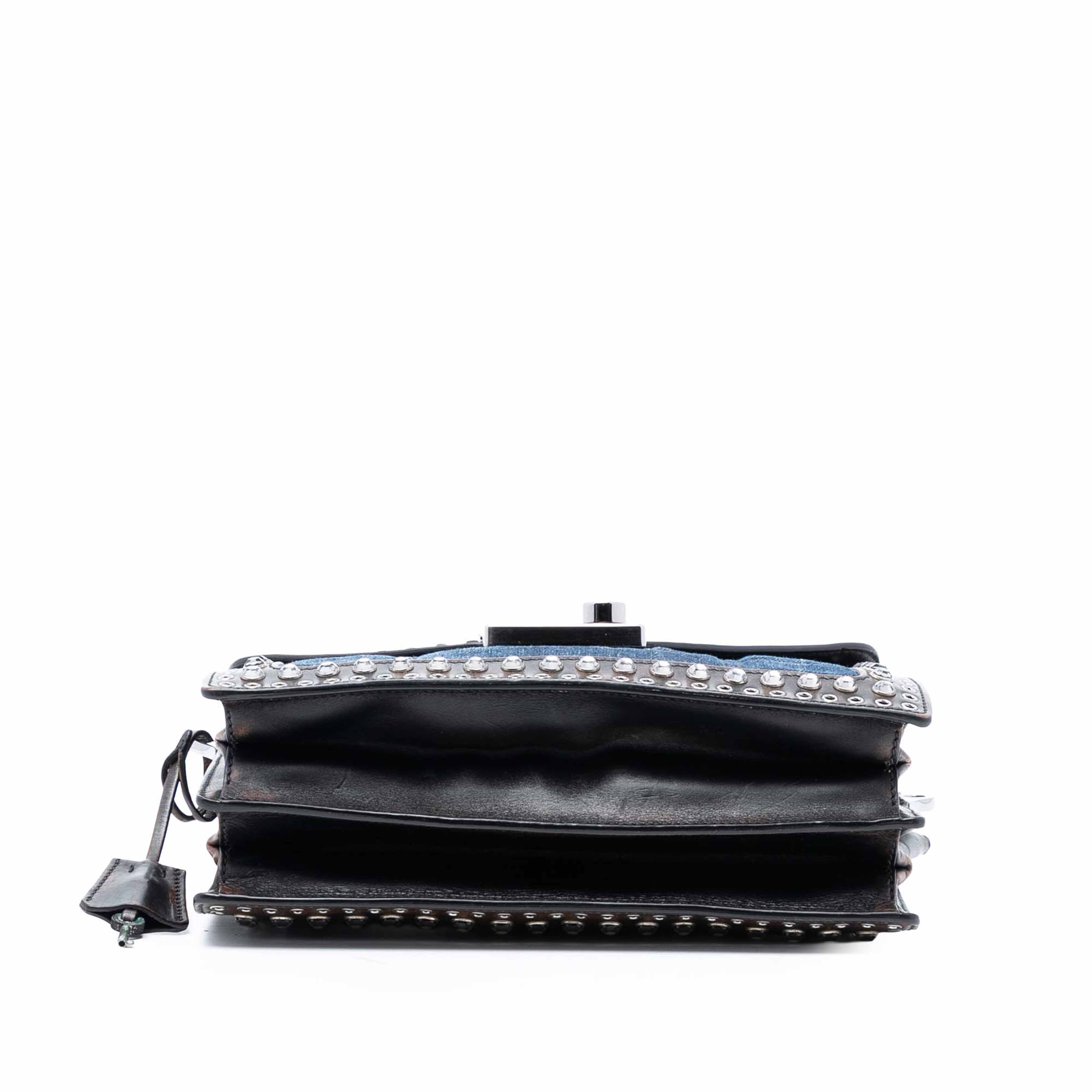 Prada Studded Denim Sound Lock Crossbody, från Luxclusif, i färgen denim. Klicka för att öppna bilden i stort format